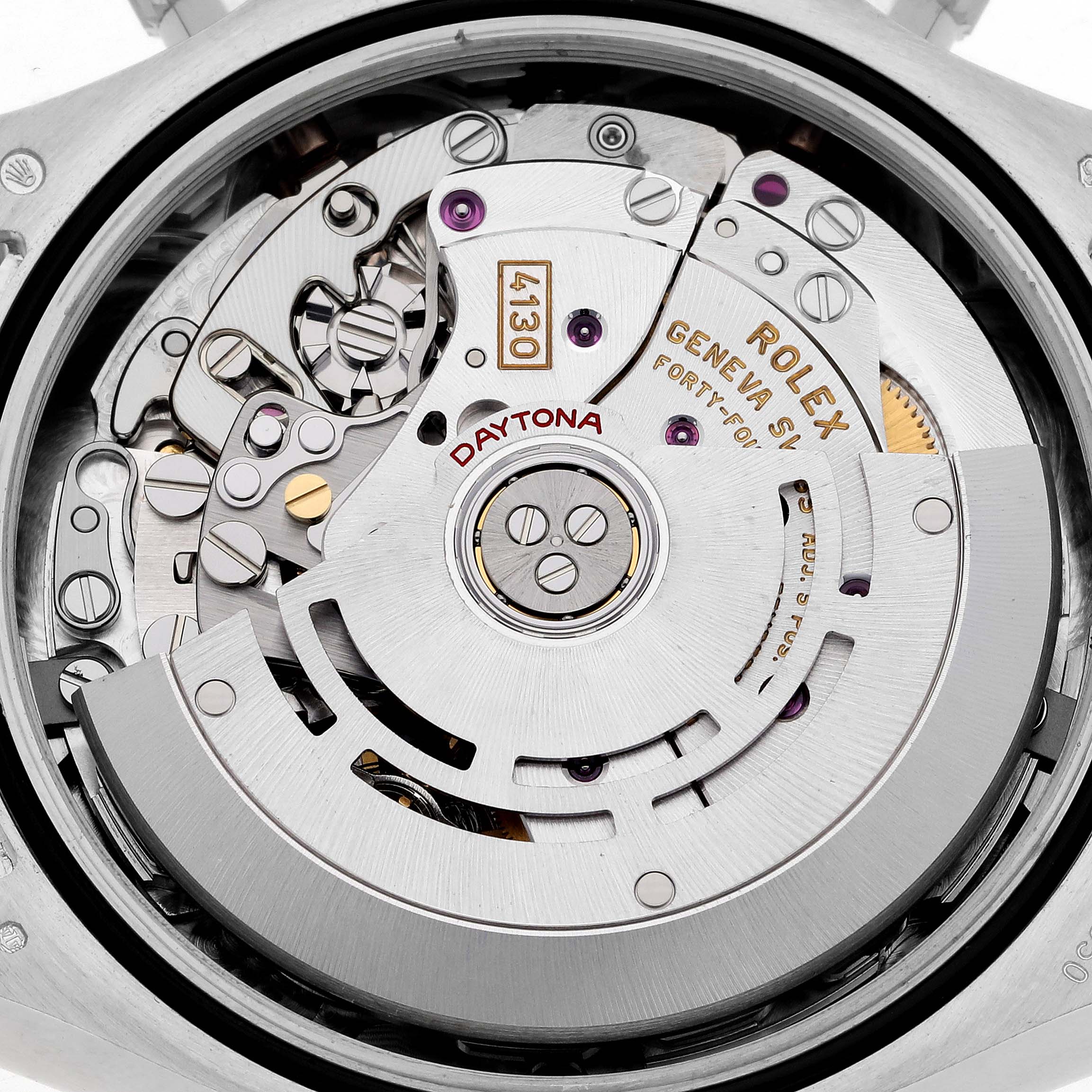 The image shows the movement mechanism of a Rolex Daytona 116506 Men's Platinum Blue Dial 116506 Men's Platinum Blue Dial watch from a top-down angle, highlighting gears and components.