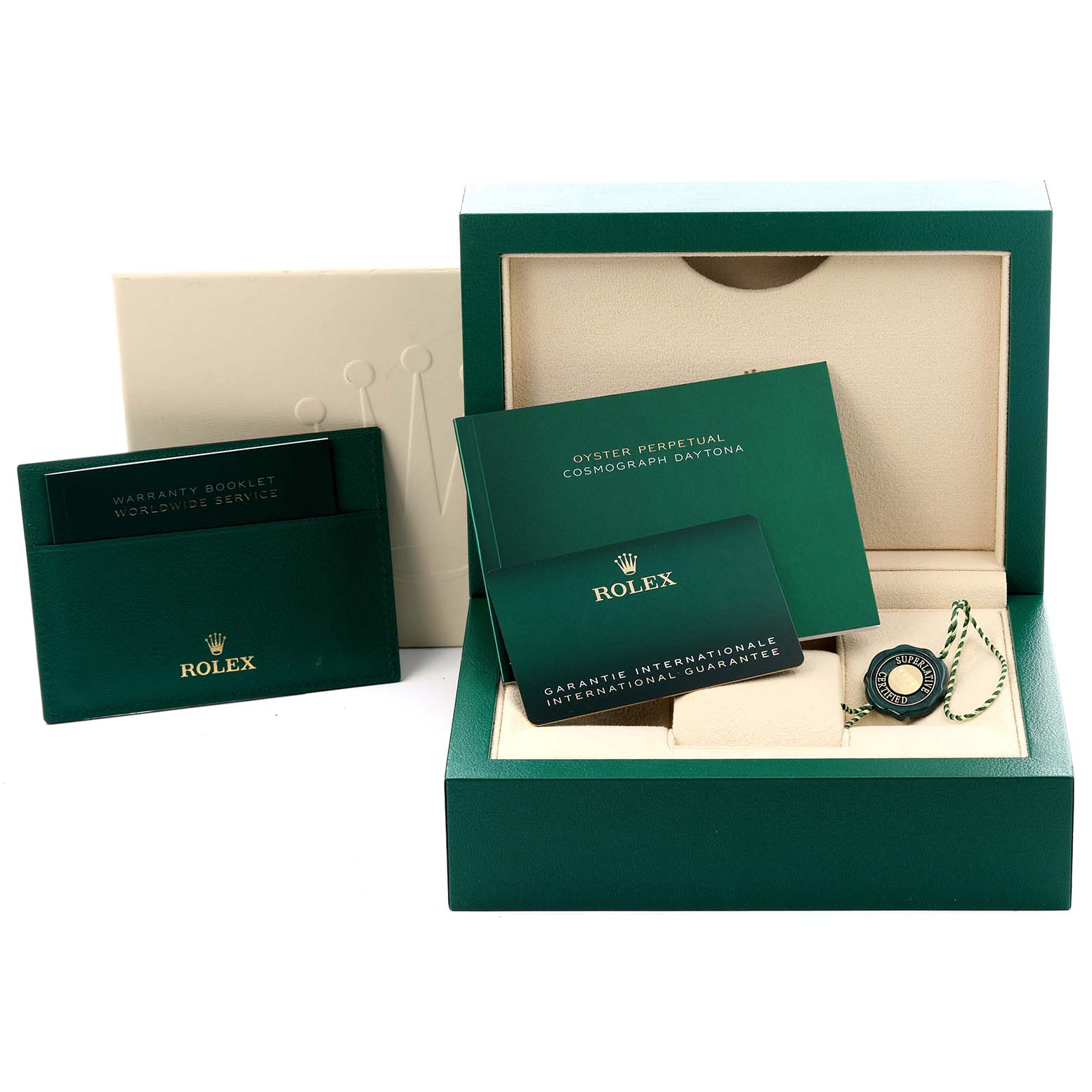 The image shows the packaging and accessories for a Rolex Daytona 126515 Men's Rose Gold Black Dial 126515 Men's Rose Gold Black Dial, including the box, warranty card, booklet, and tag.