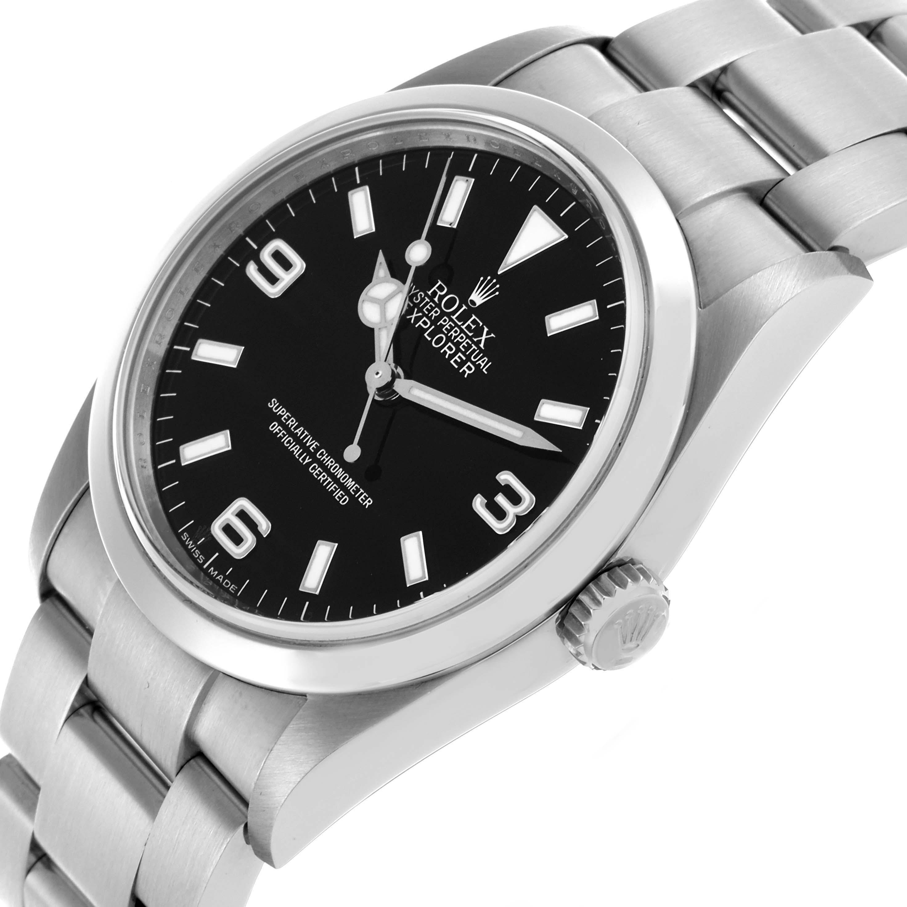 The Rolex Explorer 114270 Men's Stainless Steel Black Dial 114270 Men's Stainless Steel Black Dial watch is shown at an angled side view featuring the dial, case, crown, and bracelet.