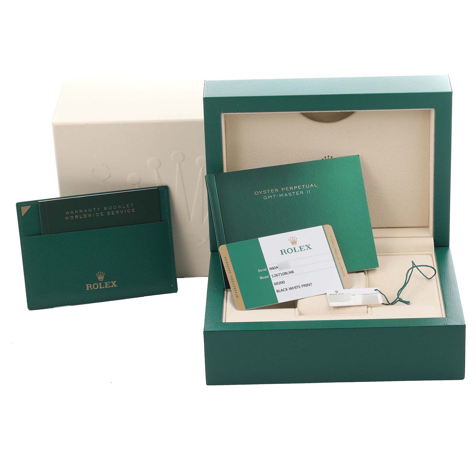 The image shows Rolex GMT-Master 126710BLNR Men
s Stainless Steel Black Dial 126710BLNR Men
s Stainless Steel Black Dial packaging, warranty booklets, and an Best Quality
ity card at an angle from above.