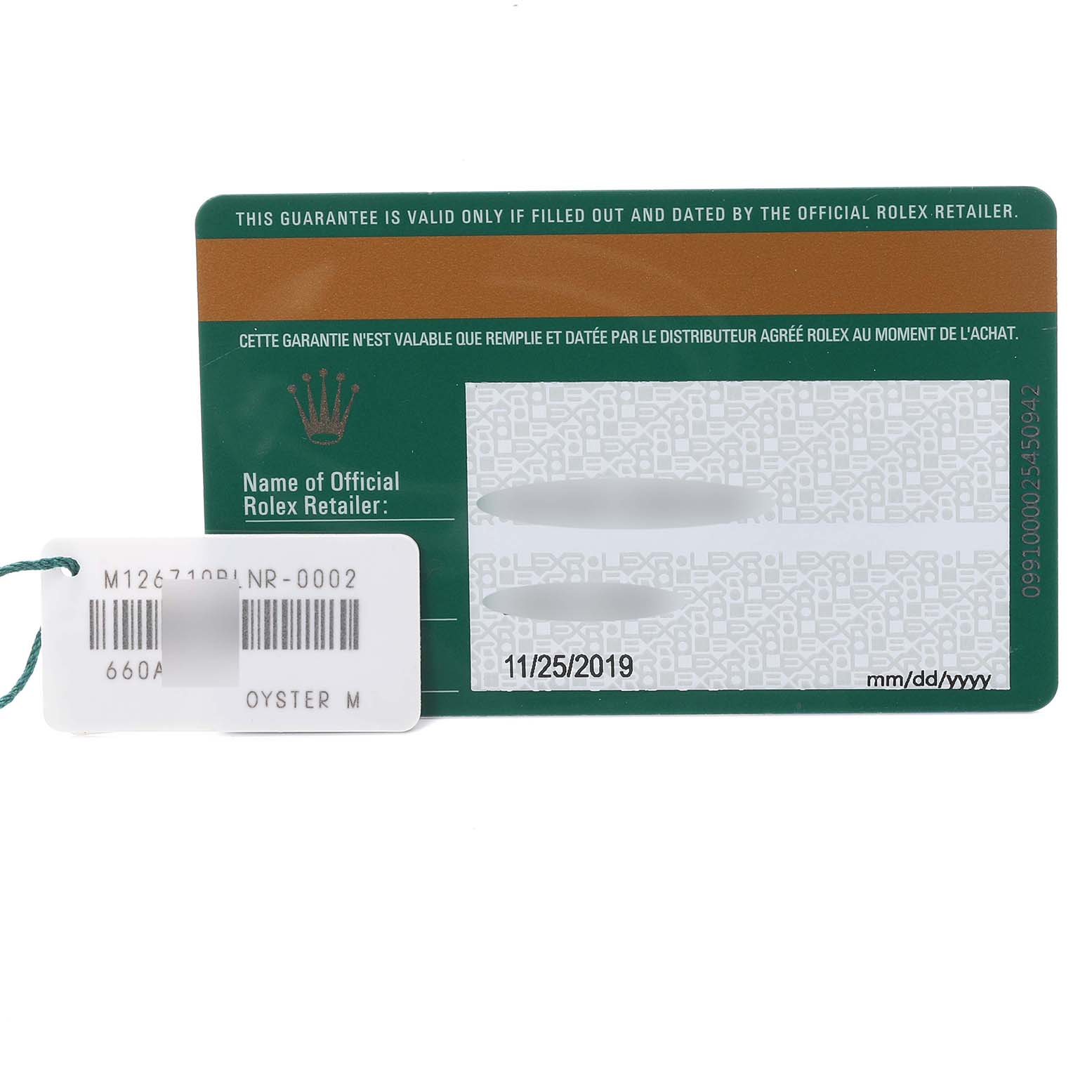 The image shows a Rolex GMT-Master 126710BLNR Men
s Stainless Steel Black Dial 126710BLNR Men
s Stainless Steel Black Dial model warranty card with the model tag attached.