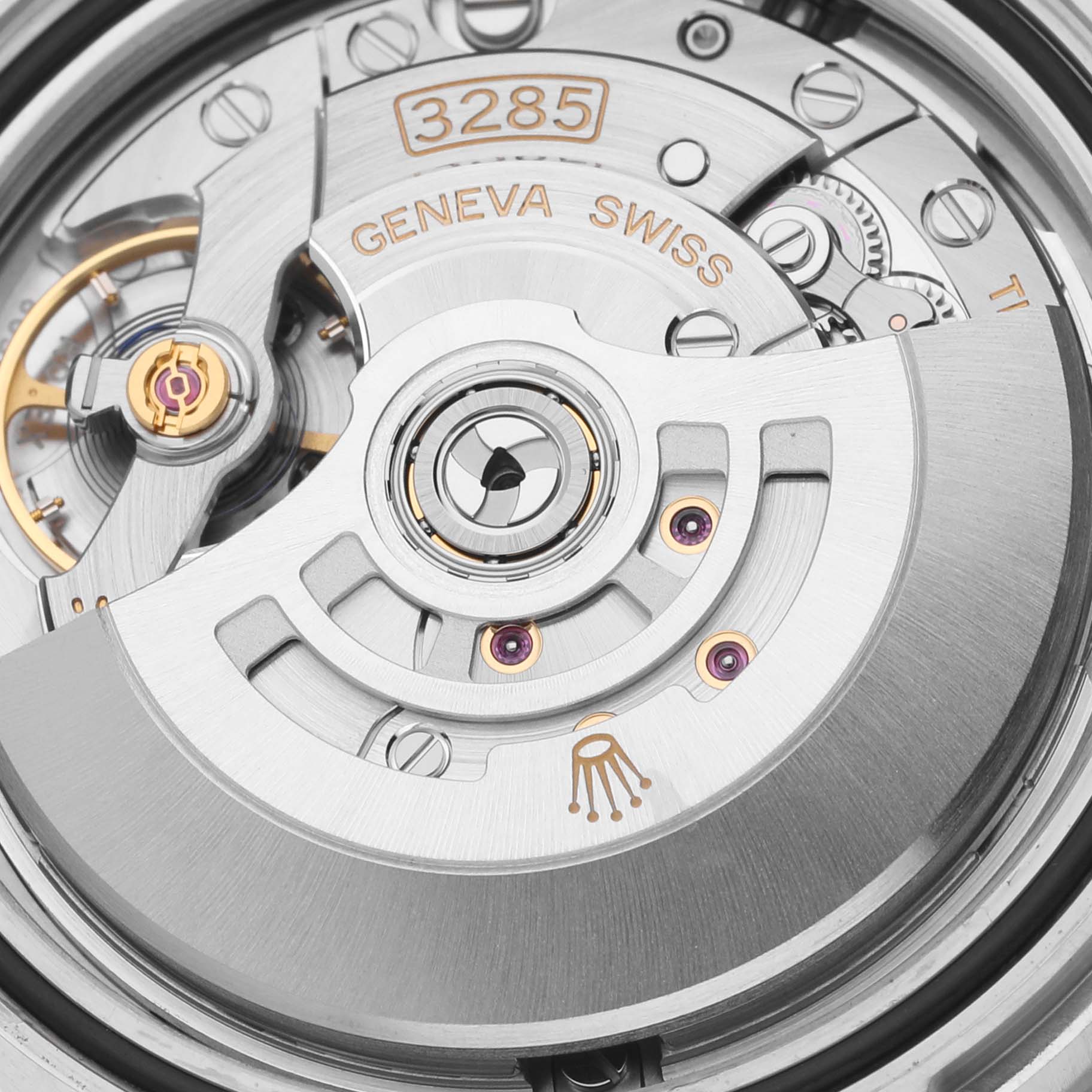 The image shows a close-up of the Rolex GMT-Master 126710BLNR Men
s Stainless Steel Black Dial 126710BLNR Men
s Stainless Steel Black Dial
s movement, focusing on the rotor and gears.