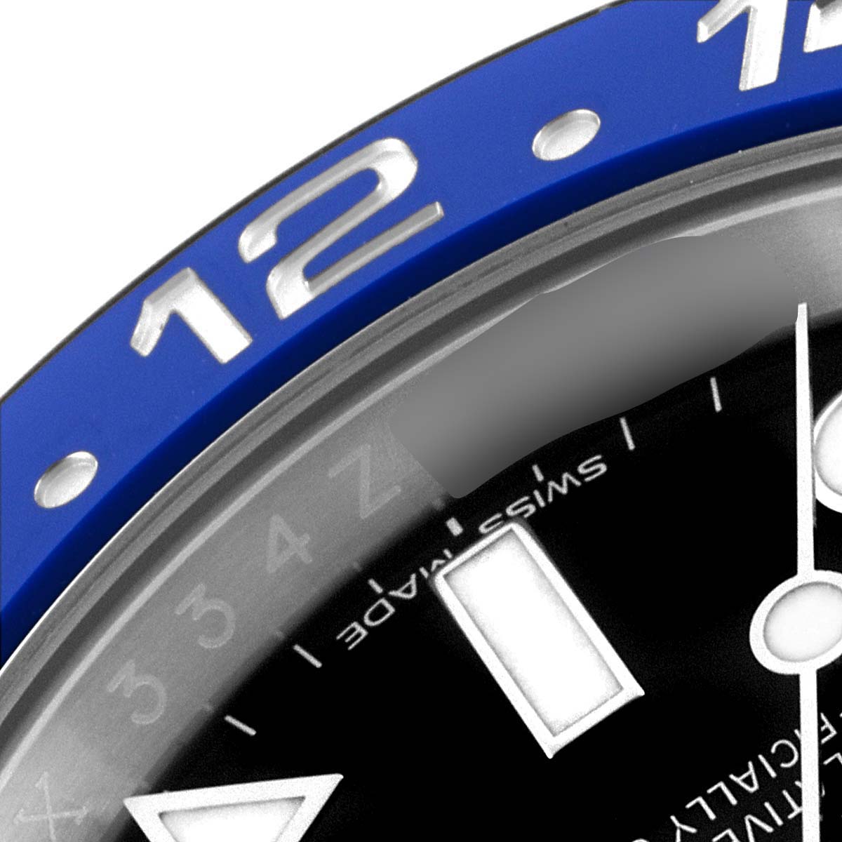 The image shows a close-up of the bezel and dial of a Rolex GMT-Master 116710 Men
s Stainless Steel Black Dial 116710 Men
s Stainless Steel Black Dial watch, highlighting the "12" on the blue bezel and part of the face.