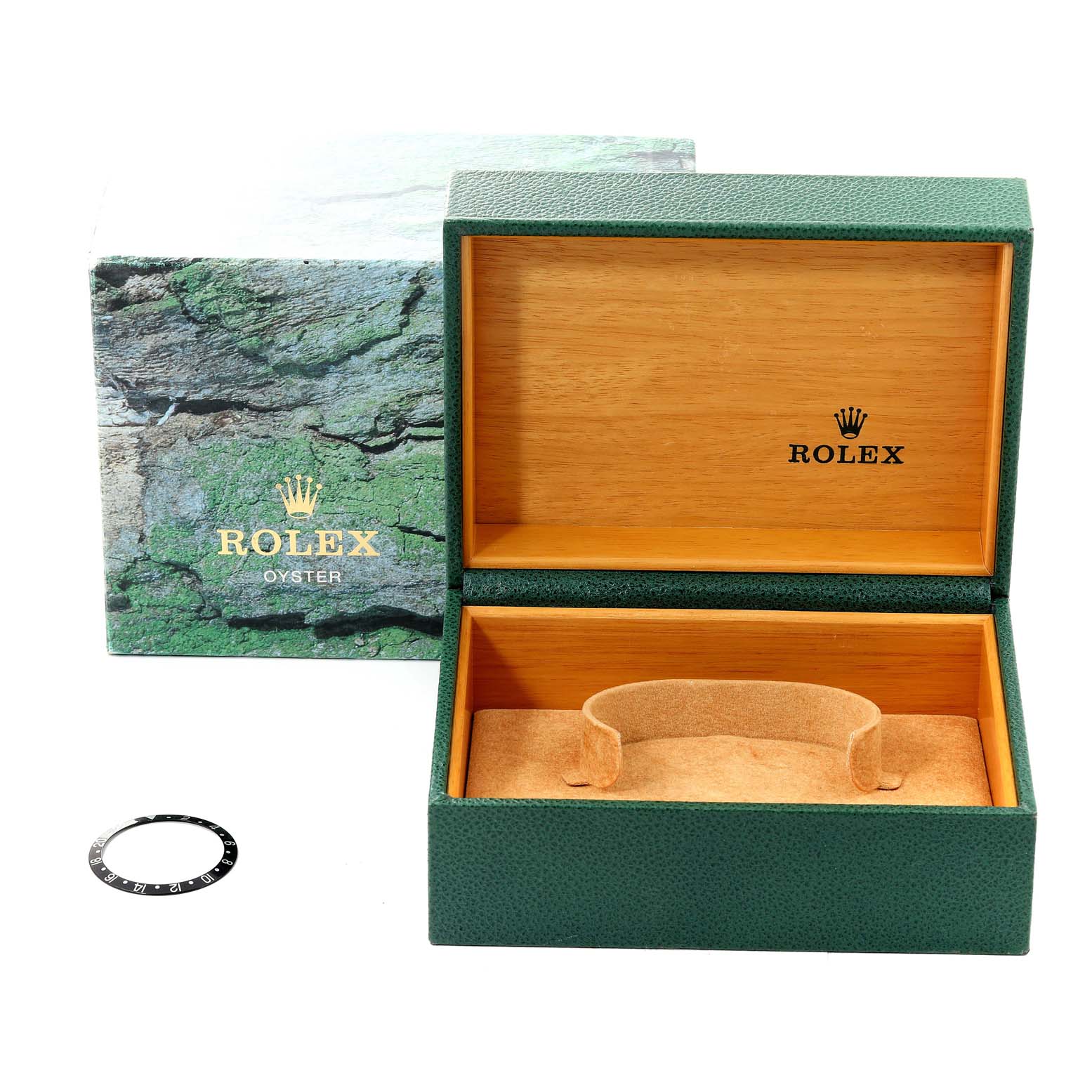 The image shows the open green Rolex box and a separate bezel ring for a Rolex GMT-Master 16710 Men
s Stainless Steel Black Dial 16710 Men
s Stainless Steel Black Dial watch.