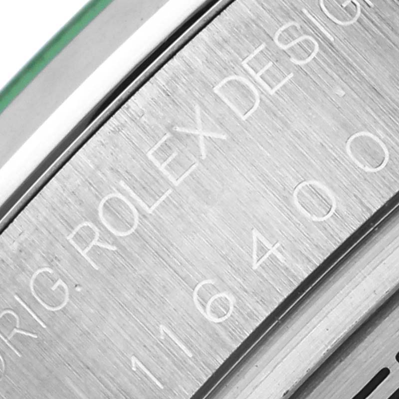 The image shows a close-up of the engraved side of the Rolex Milgauss 116400GV Men's Stainless Steel Black Dial 116400GV Men's Stainless Steel Black Dial model bezel.