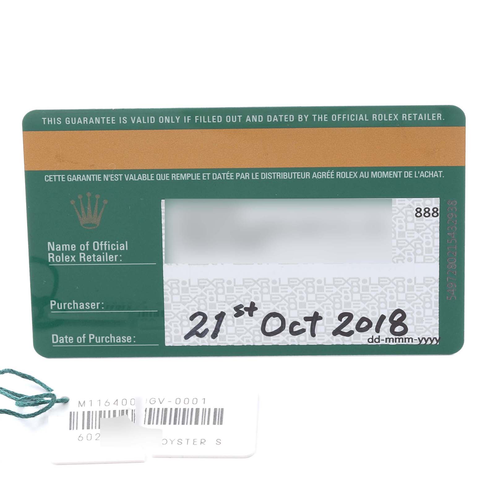 The image shows a Rolex Milgauss 116400GV Men's Stainless Steel Black Dial 116400GV Men's Stainless Steel Black Dial guarantee card and a barcode tag laying flat.