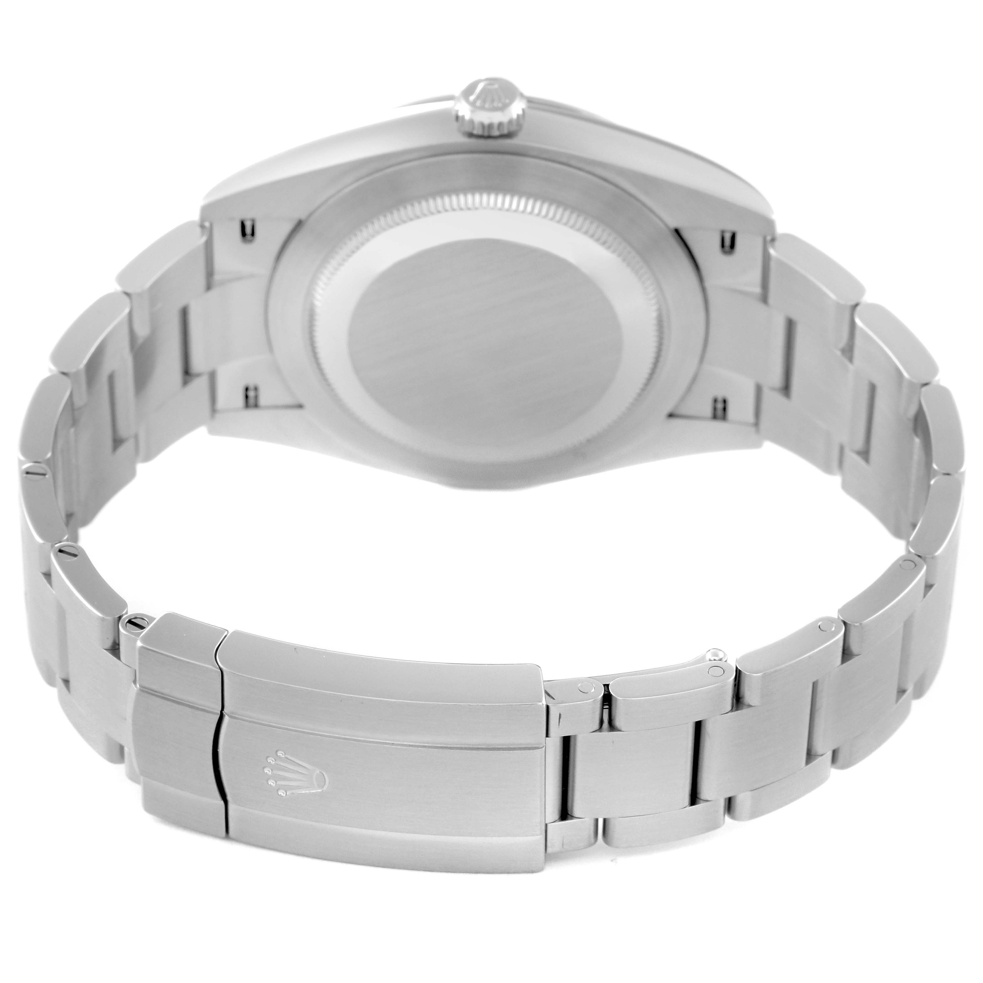 The image shows the back view of a Rolex Oyster Perpetual 124300 Men
s Stainless Steel Silver Dial 124300 Men
s Stainless Steel Silver Dial watch, focusing on its case back and metal bracelet with clasp.