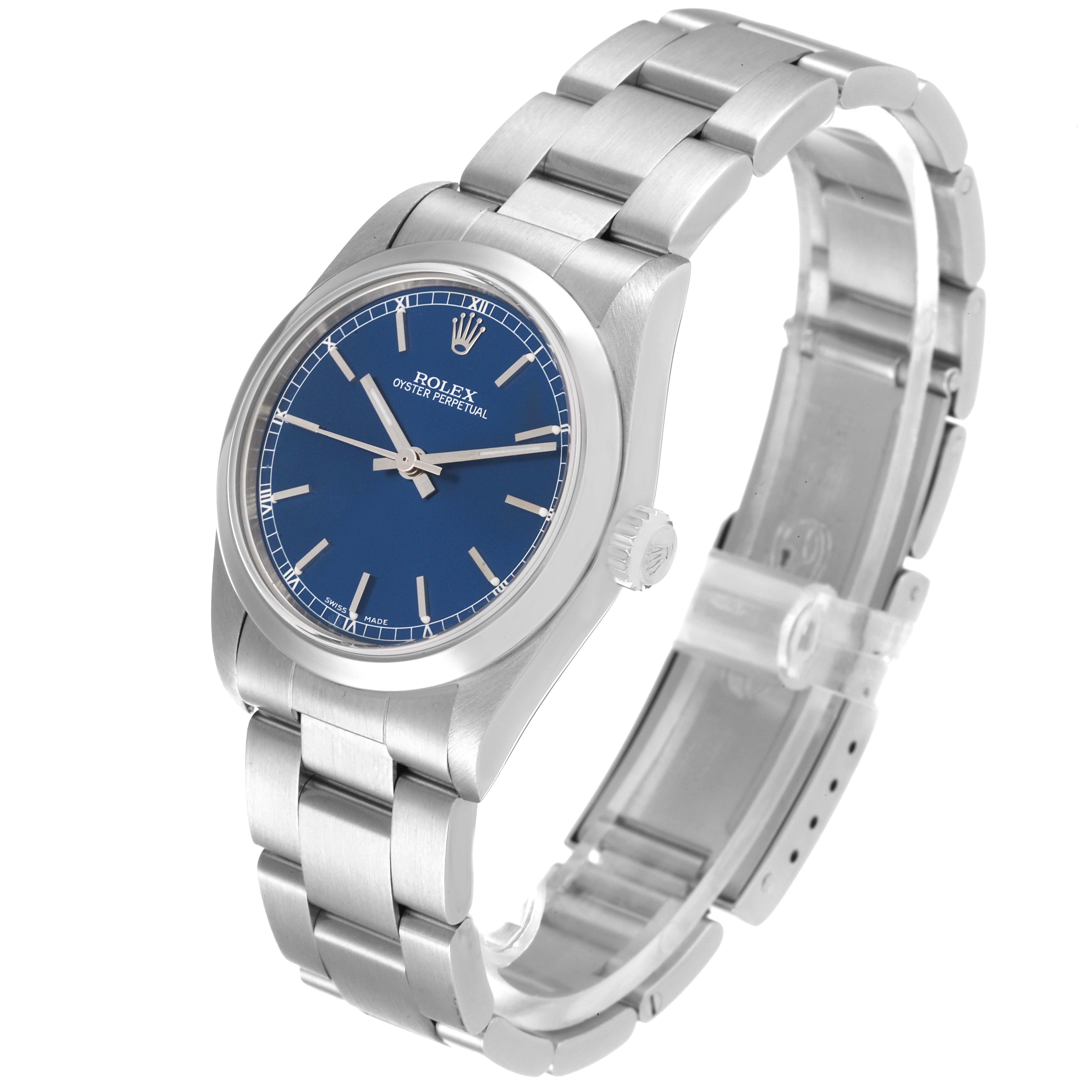 The Rolex Oyster Perpetual Mid-Size watch is displayed at a slight angle, showing the face, crown, bracelet, and clasp.