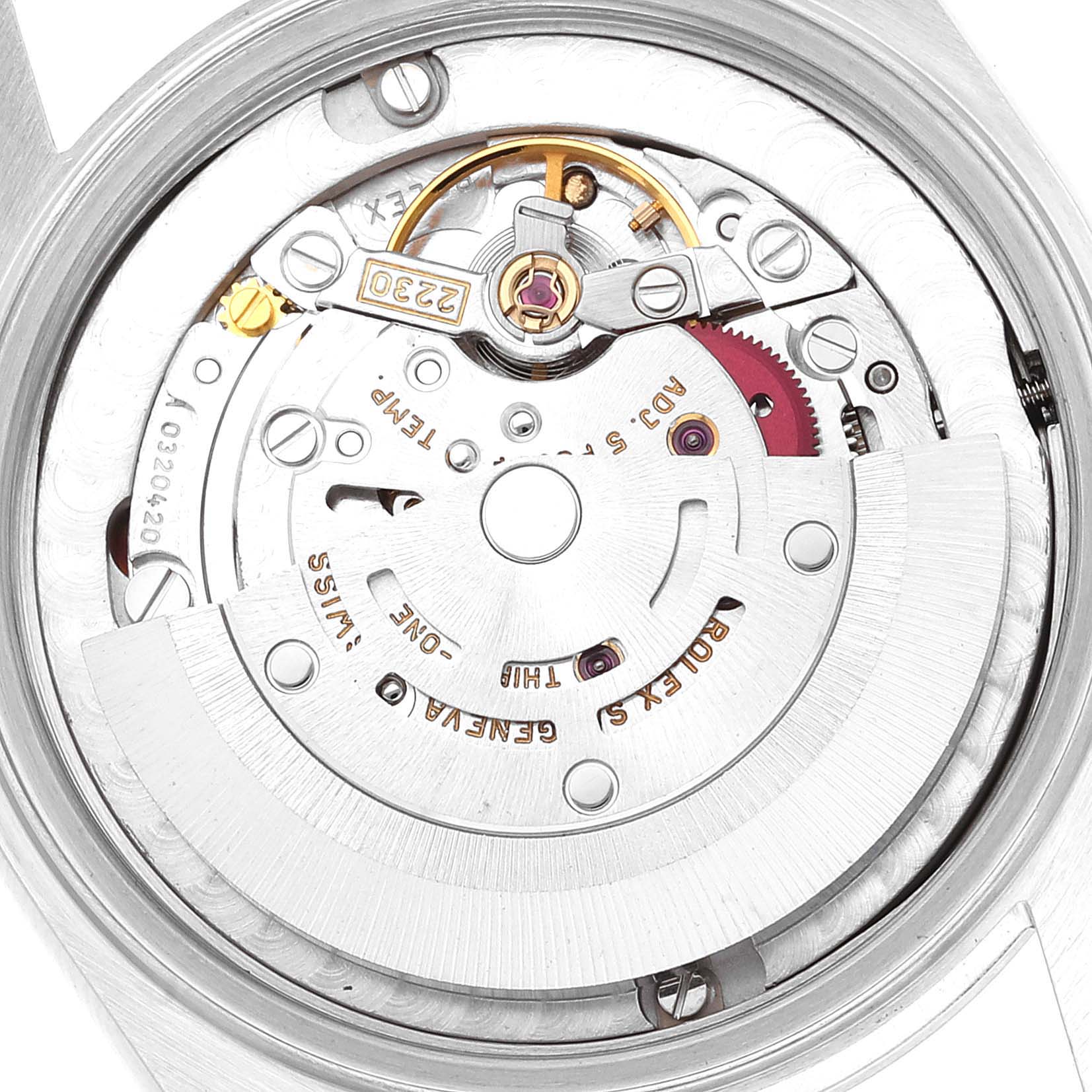 The image shows a close-up view of the movement and internal mechanism of a Mid-Size Rolex watch.