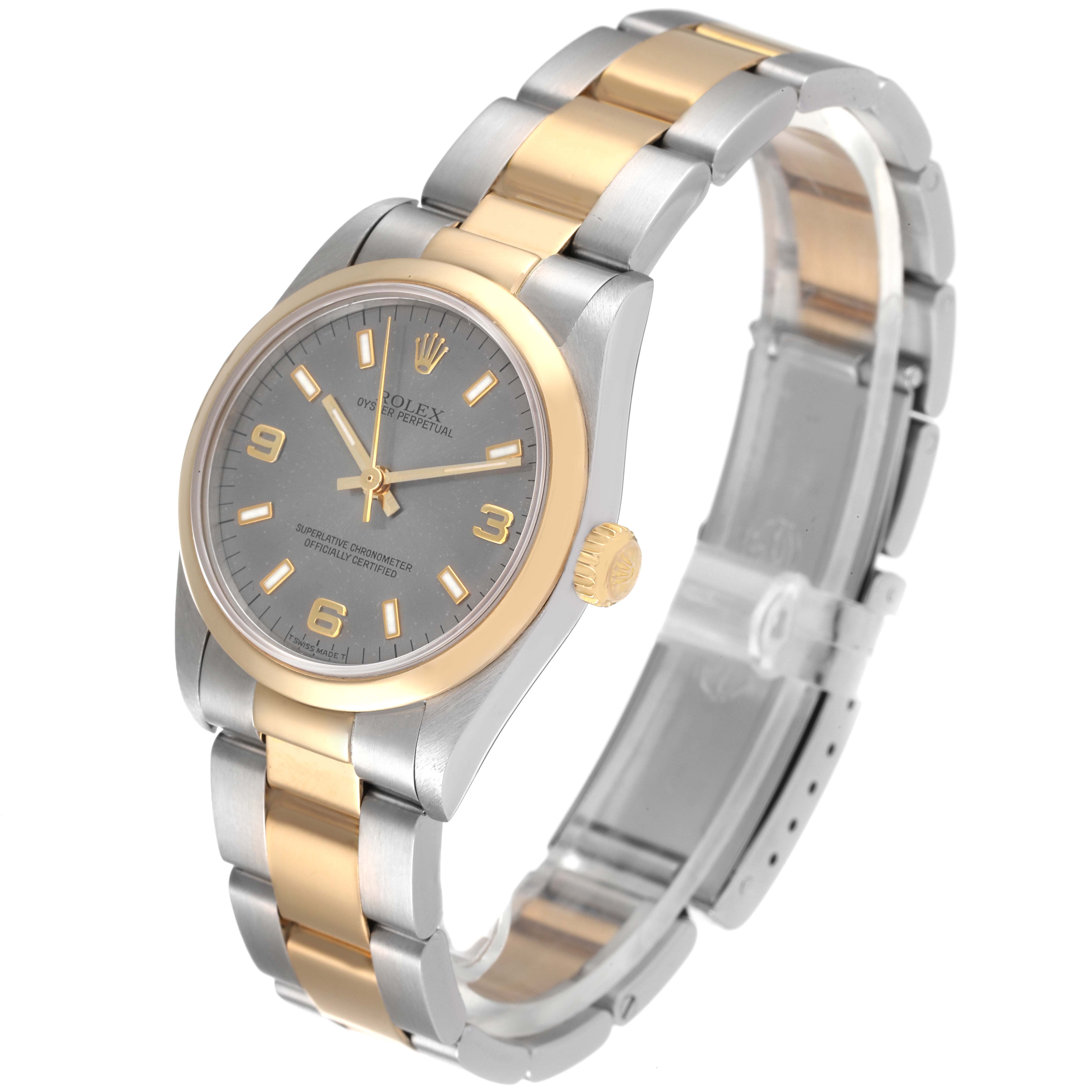 The image shows a Rolex Mid-Size 77483 Women's Steel and Gold (two tone) Grey Dial 77483 Women's Steel and Gold (two tone) Grey Dial watch at an oblique angle, highlighting its dial, bracelet, bezel, and crown.