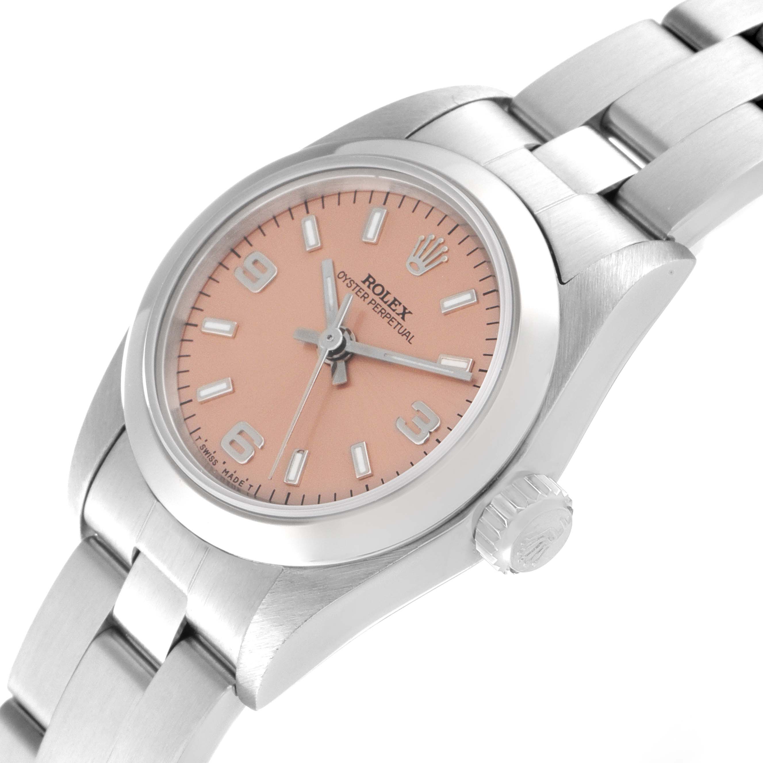 The image showcases a Rolex Oyster Perpetual 67180 Women
s Stainless Steel Pink Dial 67180 Women
s Stainless Steel Pink Dial watch at a slight angle, highlighting its dial, crown, and part of its bracelet.