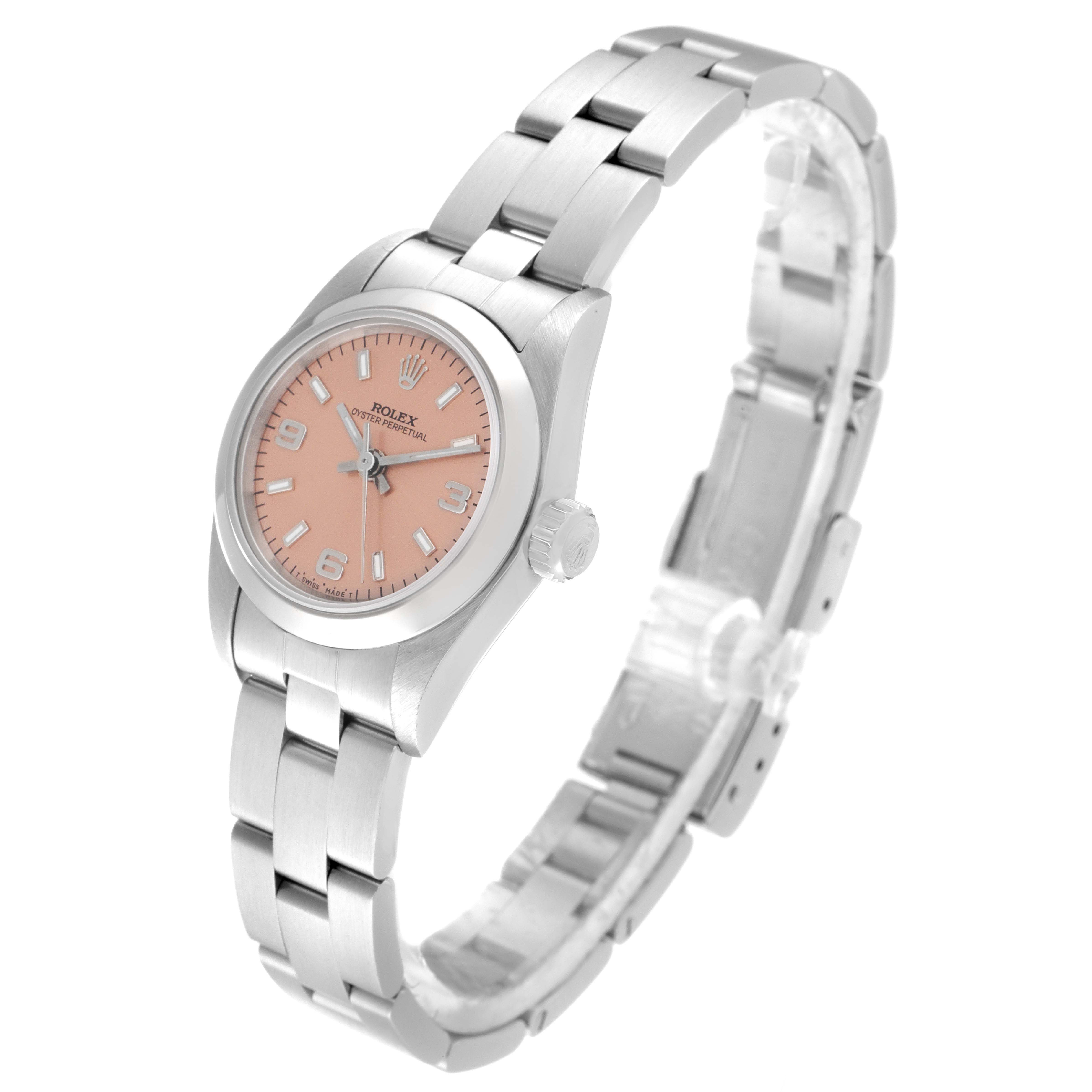 The image shows a side-angle view of a Rolex Oyster Perpetual 67180 Women
s Stainless Steel Pink Dial 67180 Women
s Stainless Steel Pink Dial watch displaying its bracelet, case, crown, and salmon dial.