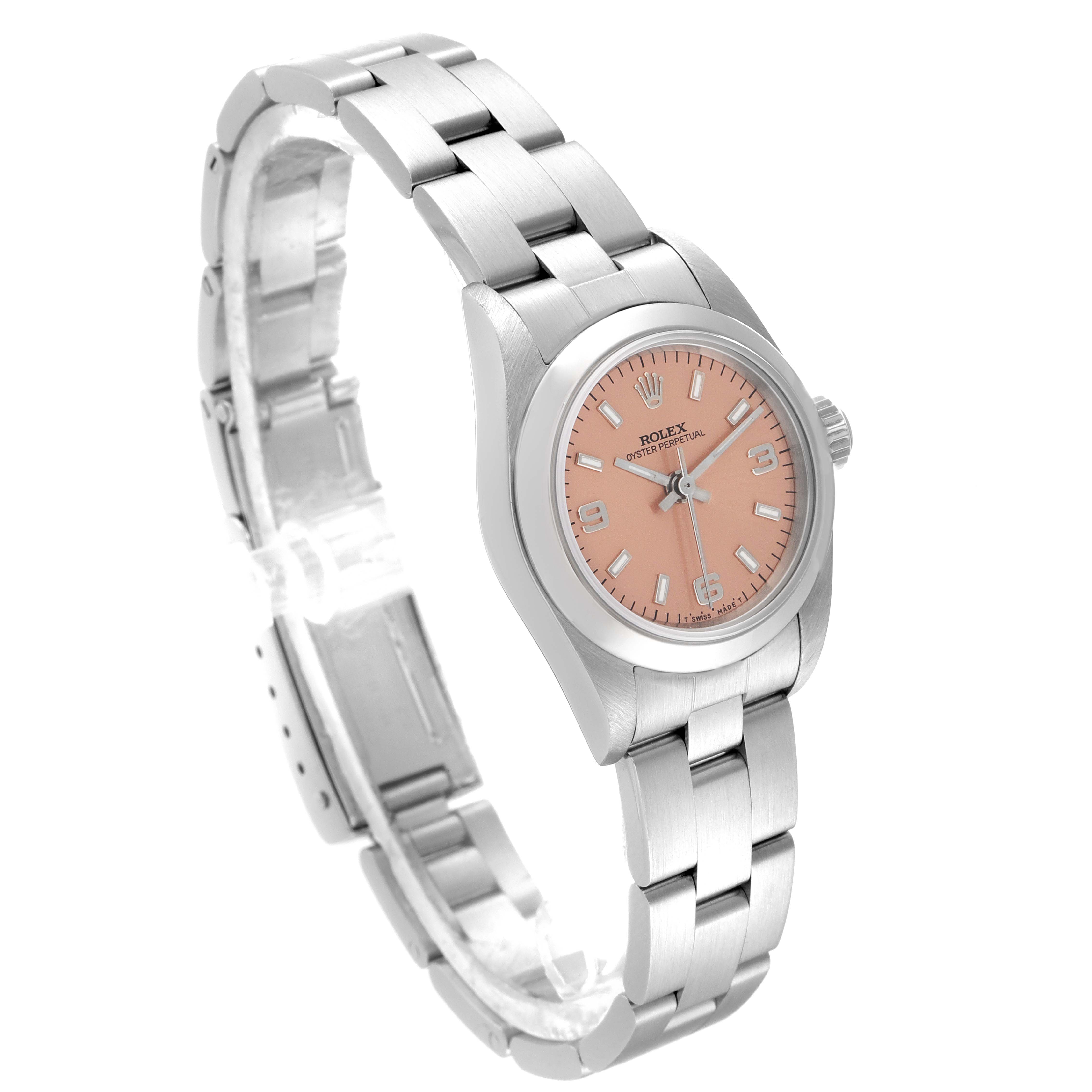 The image shows a side-angle view of a Rolex Oyster Perpetual 67180 Women
s Stainless Steel Pink Dial 67180 Women
s Stainless Steel Pink Dial watch, highlighting its bracelet, case, and pink dial.