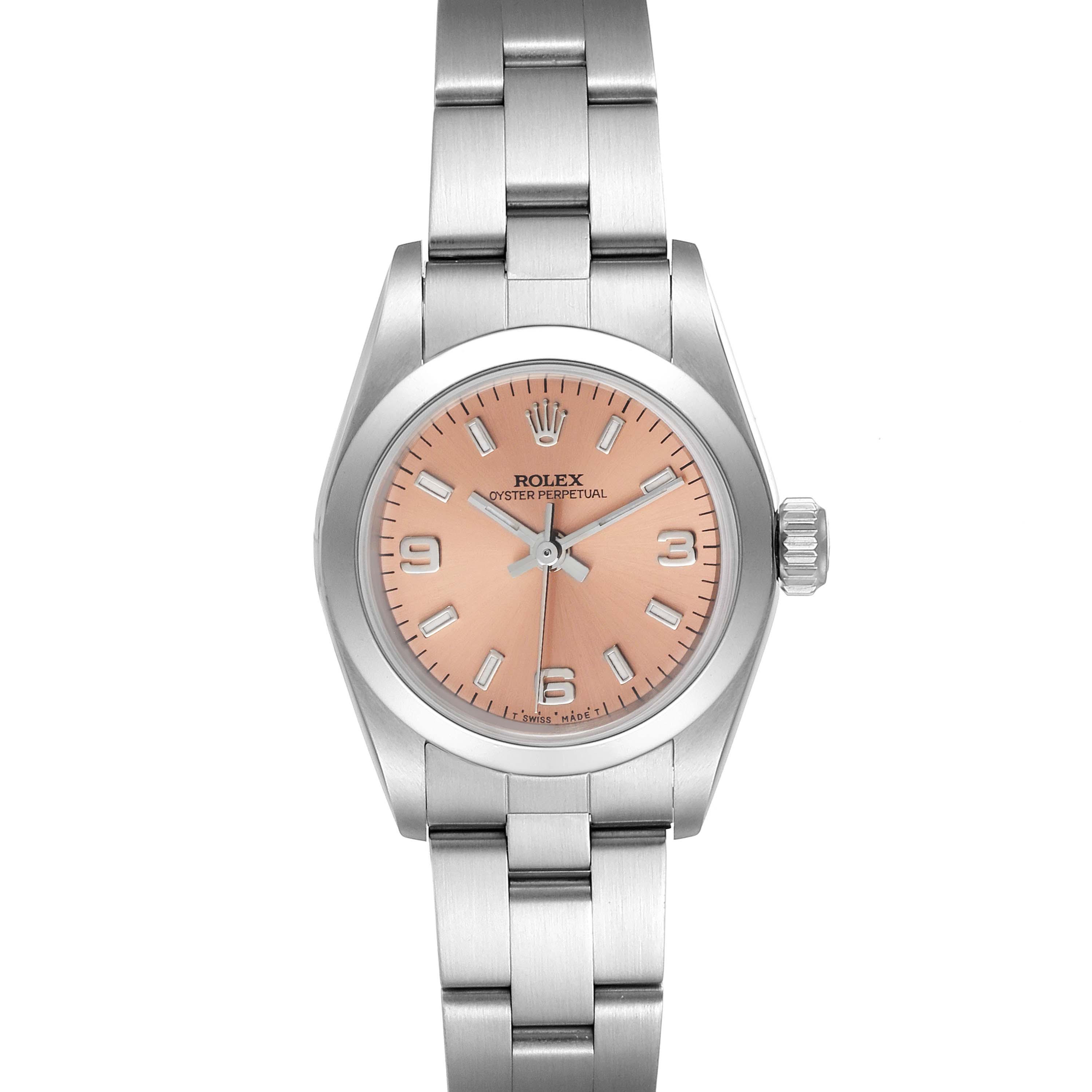 This Rolex Oyster Perpetual 67180 Women
s Stainless Steel Pink Dial 67180 Women
s Stainless Steel Pink Dial watch is shown from a top-down angle, displaying the full face, bezel, crown, and part of the bracelet.