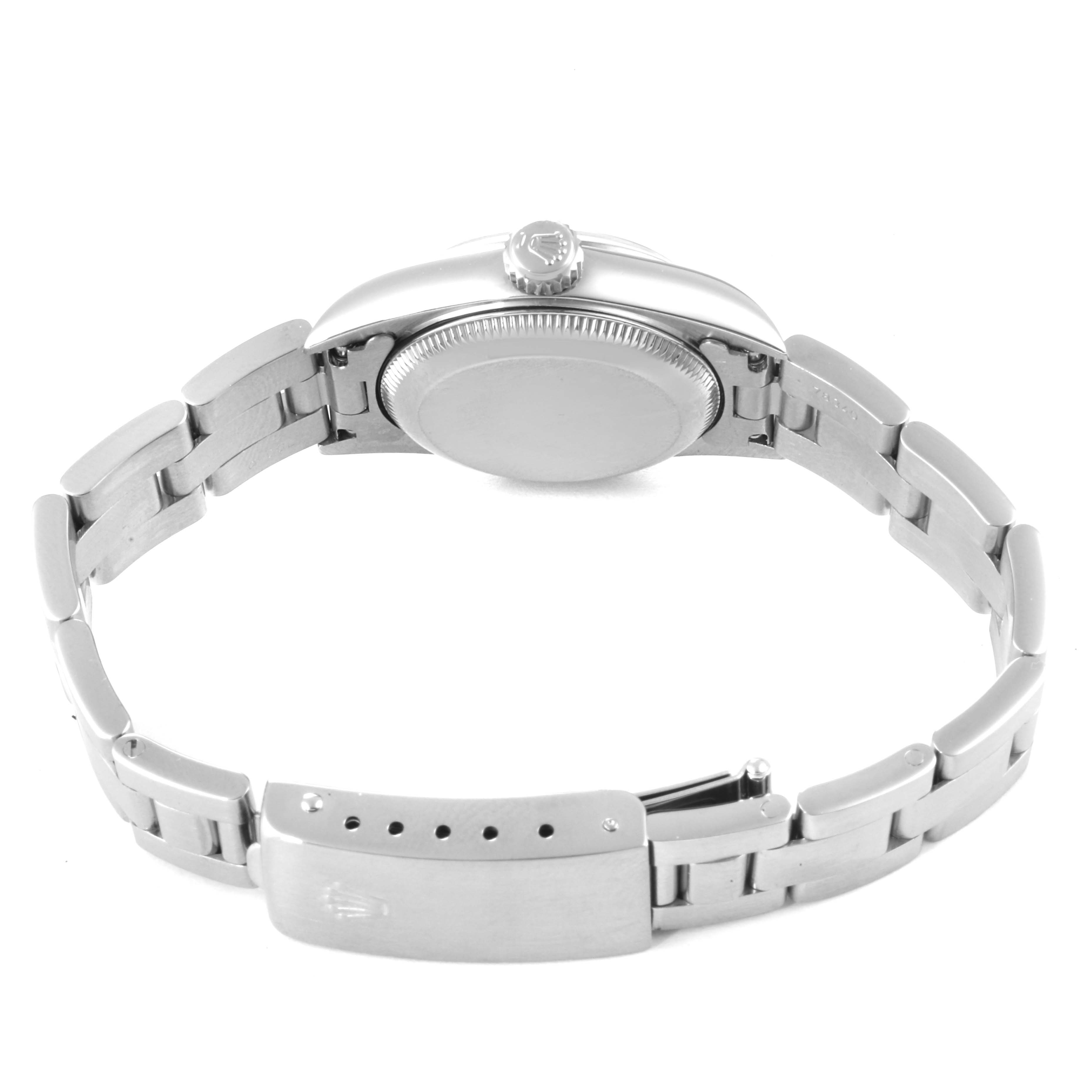 This image shows the back and side of a Rolex Oyster Perpetual 67180 Women
s Stainless Steel Pink Dial 67180 Women
s Stainless Steel Pink Dial watch, highlighting its strap and clasp.