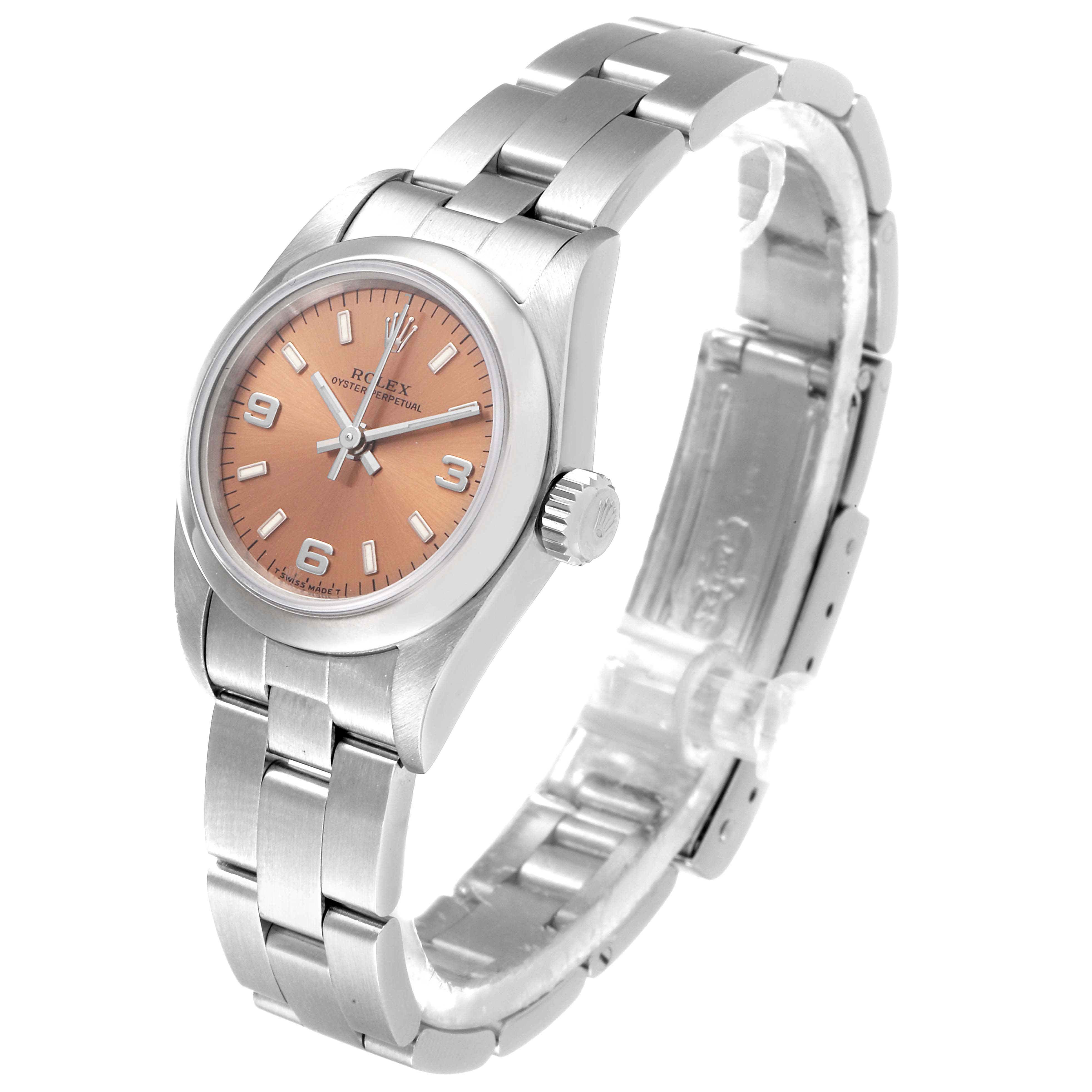 The Rolex Oyster Perpetual 67180 Women
s Stainless Steel Pink Dial 67180 Women
s Stainless Steel Pink Dial watch is shown at a three-quarter angle, highlighting the watch face, bezel, and stainless steel bracelet.
