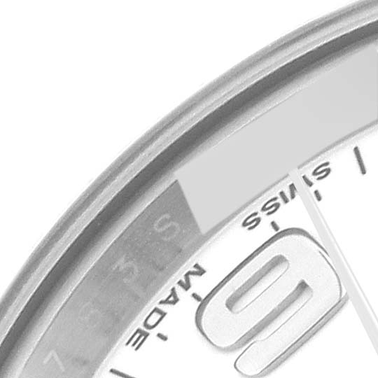 This image shows a close-up of the dial edge, numeral 9, and part of the bezel of a Rolex Oyster Perpetual 176200 Women's Stainless Steel White Dial 176200 Women's Stainless Steel White Dial watch.
