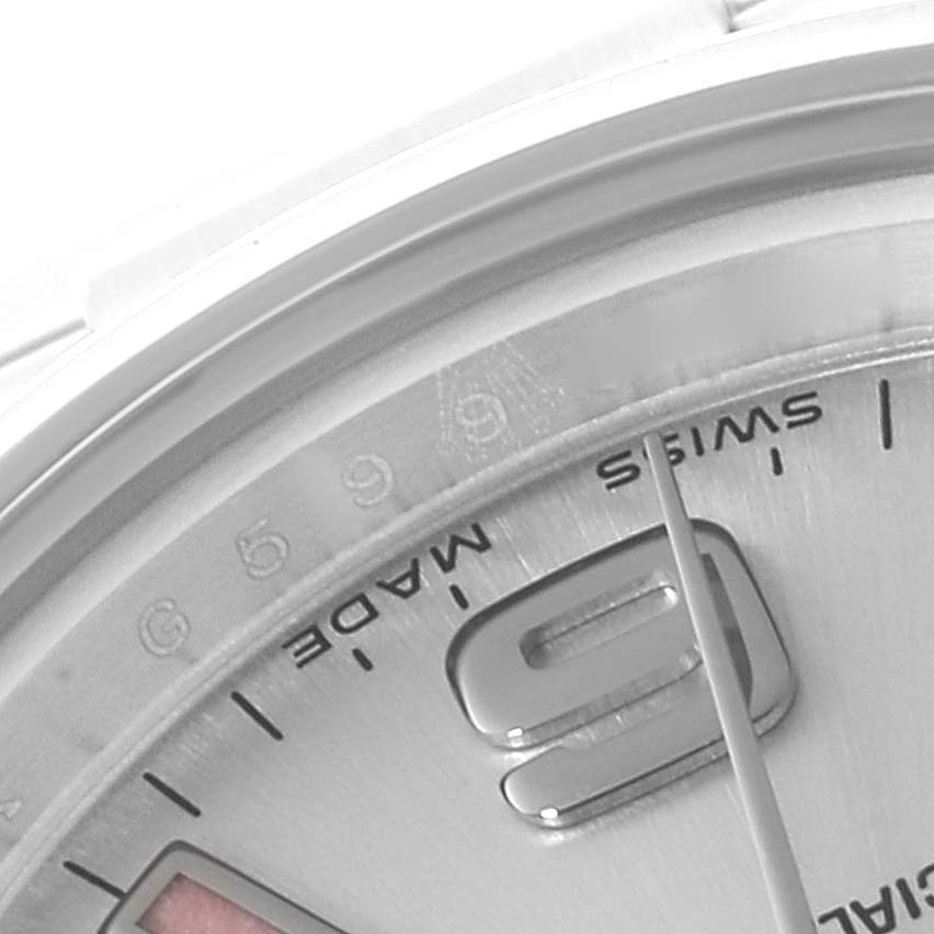 The image shows a close-up of the dial of a Rolex Oyster Perpetual 176200 Women's Stainless Steel Silver Dial 176200 Women's Stainless Steel Silver Dial watch, focusing on the "Swiss Made" text and the "9" hour marker.