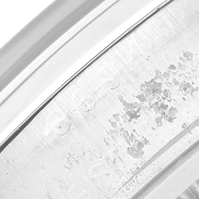 The image showcases a close-up of the case side engraving of a Rolex Vintage Collection 6694 Men
s Stainless Steel Grey Dial 6694 Men
s Stainless Steel Grey Dial watch.