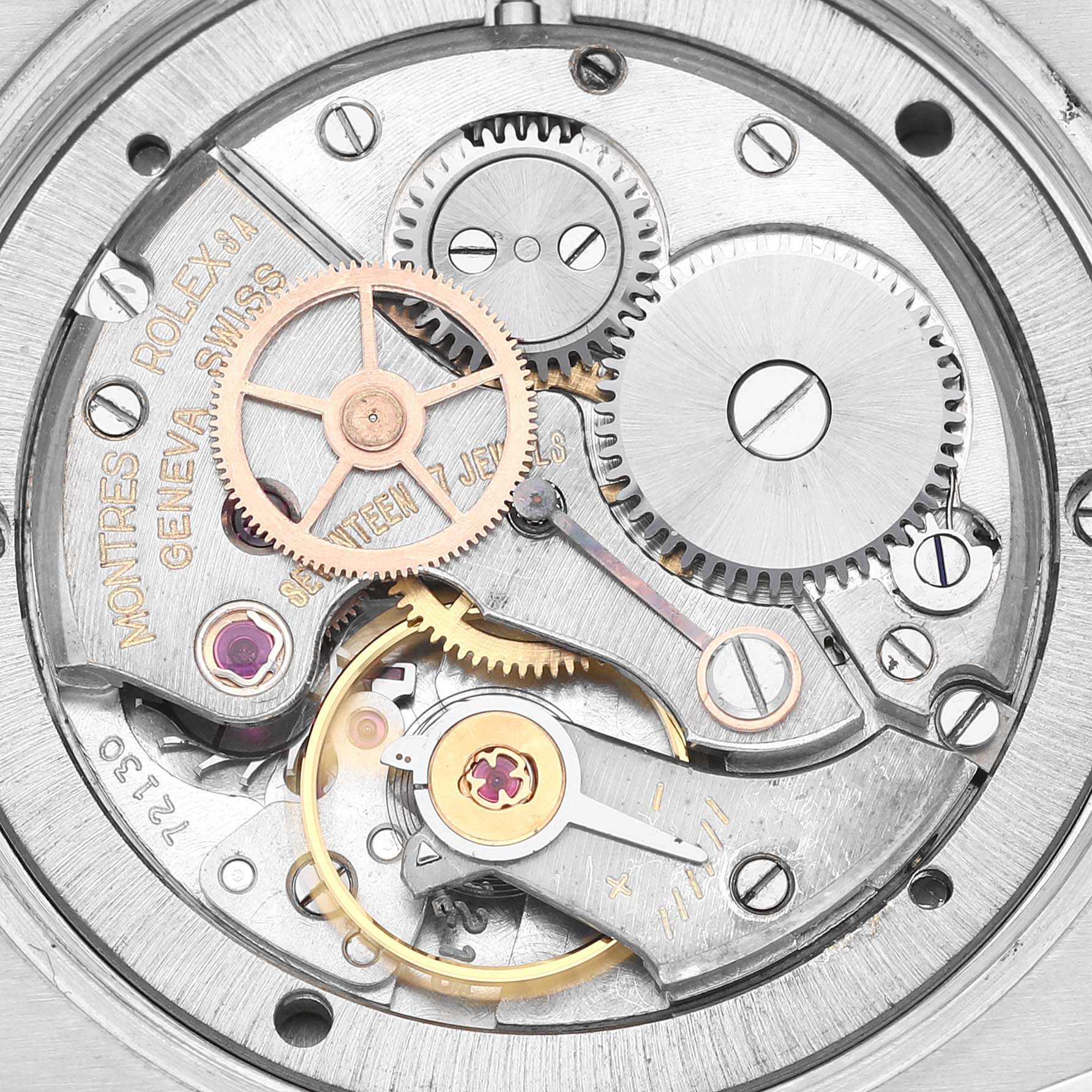 The image shows a close-up view of the inner mechanical workings of a Rolex Vintage Collection 6694 Men
s Stainless Steel Grey Dial 6694 Men
s Stainless Steel Grey Dial watch.