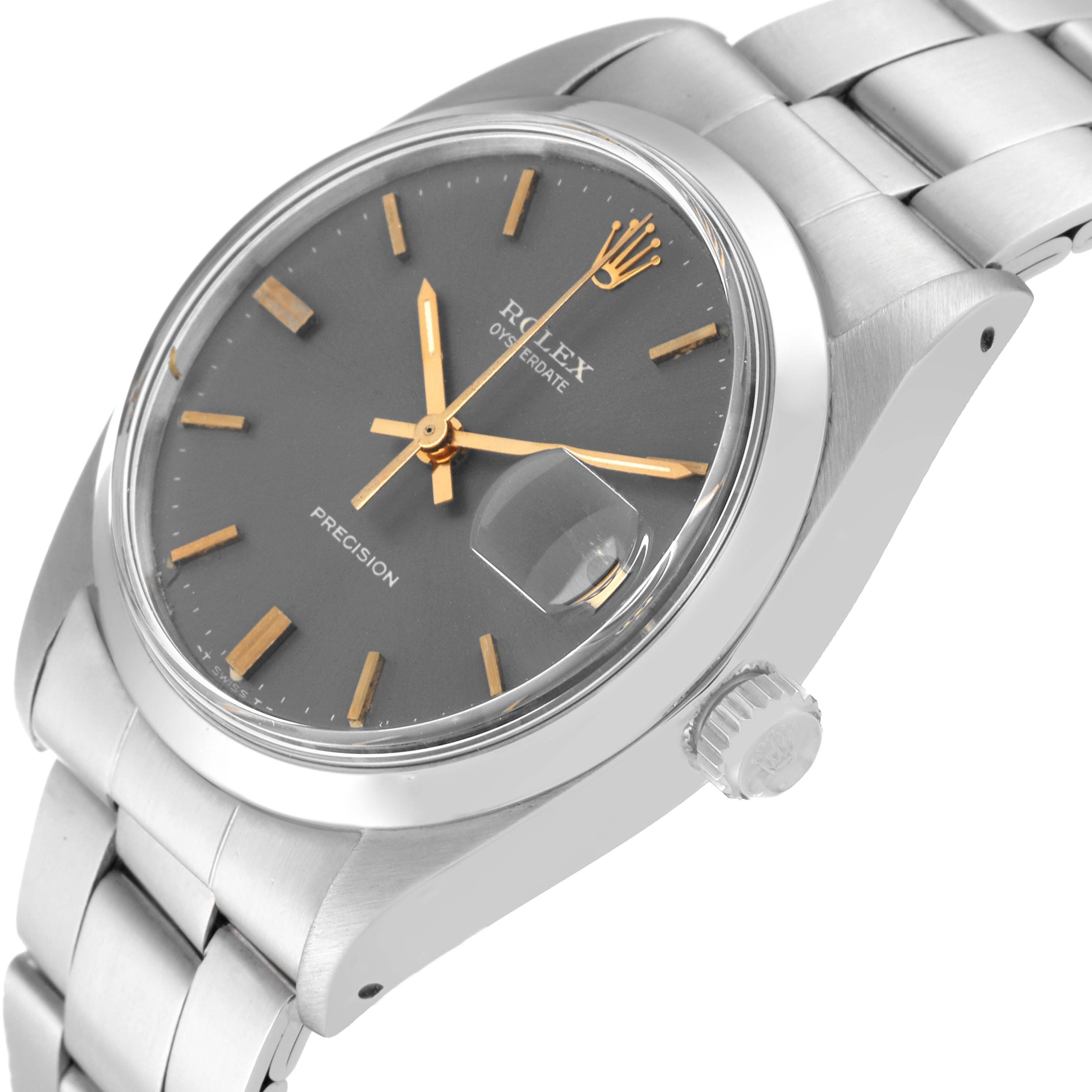 The image shows a side angle of a Rolex Vintage Collection 6694 Men
s Stainless Steel Grey Dial 6694 Men
s Stainless Steel Grey Dial watch, highlighting the watch face, crown, and part of the bracelet.