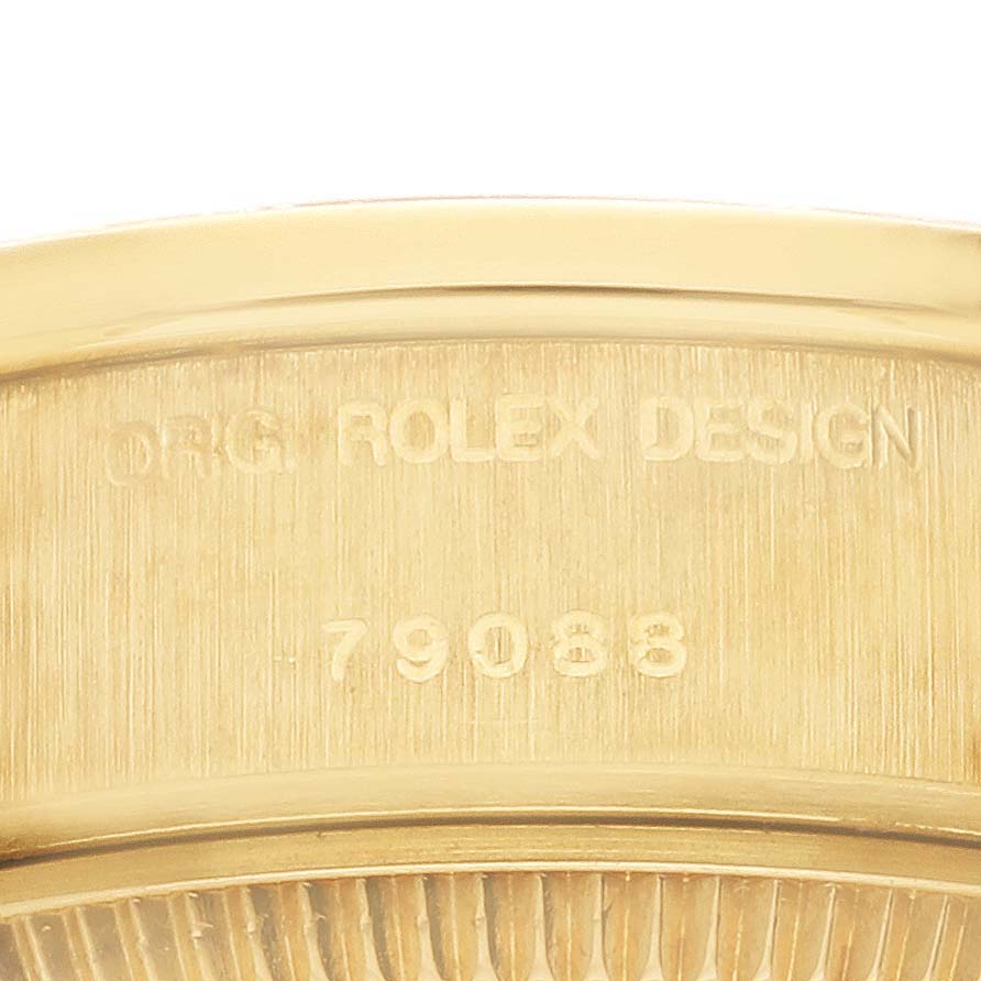 This close-up shows the side of a Rolex President 79088 Women's Yellow Gold Champagne Dial 79088 Women's Yellow Gold Champagne Dial watch, focusing on the engraved model number.