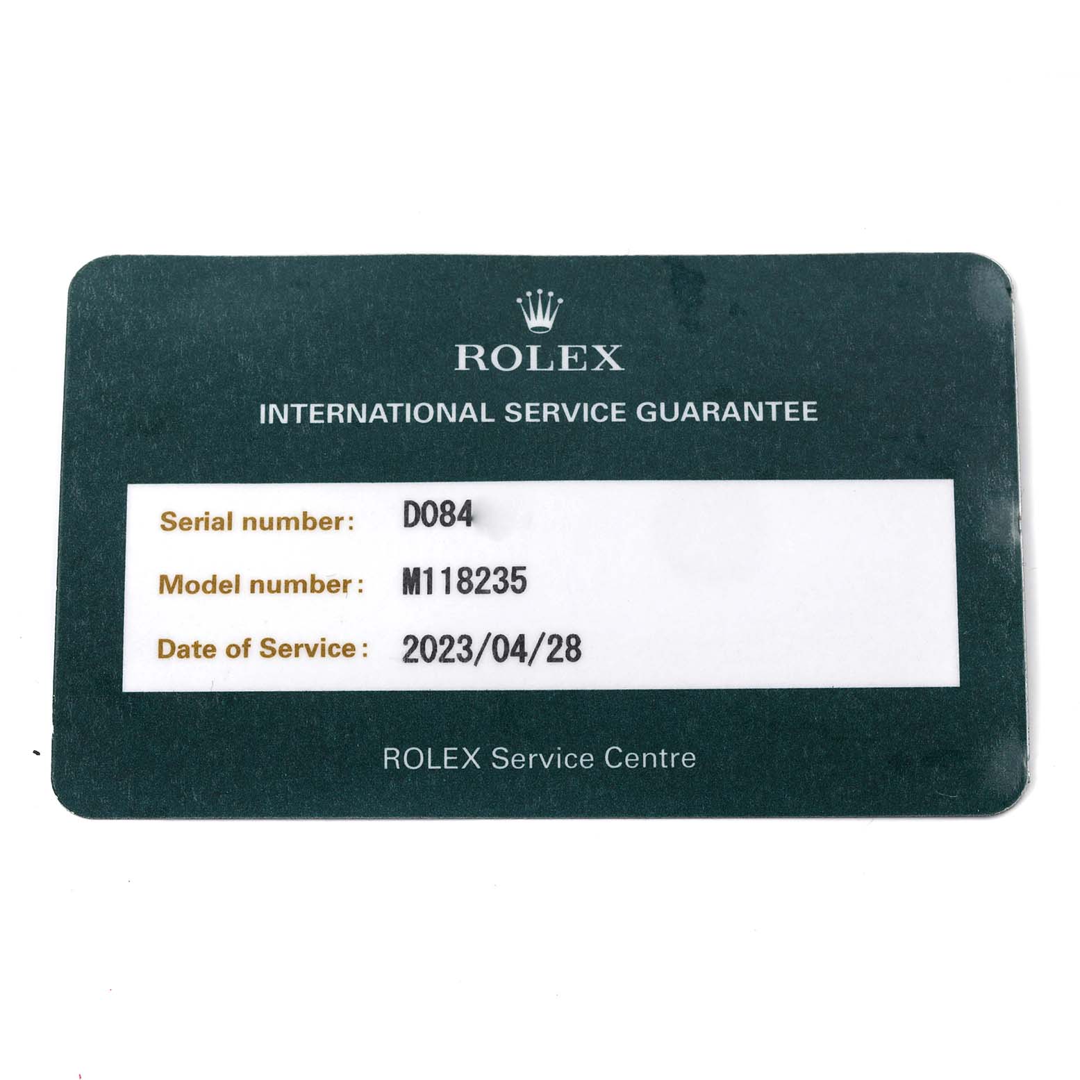 The image shows a Rolex International Service Guarantee card for the President model M118235.