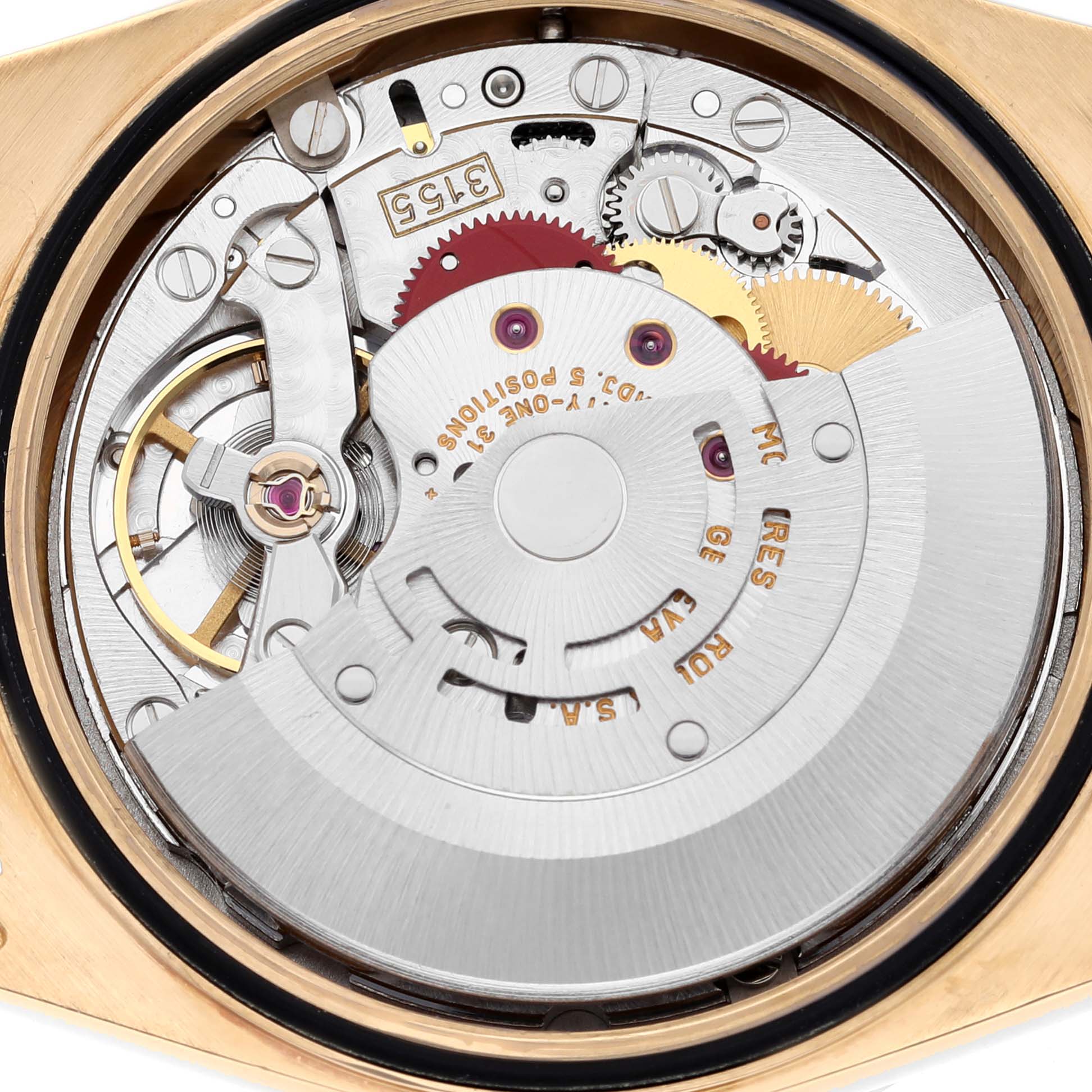The image shows the intricate internal mechanical movement of a Rolex President 18348 Men
s Yellow Gold Champagne Dial 18348 Men
s Yellow Gold Champagne Dial model watch from a close-up angle.