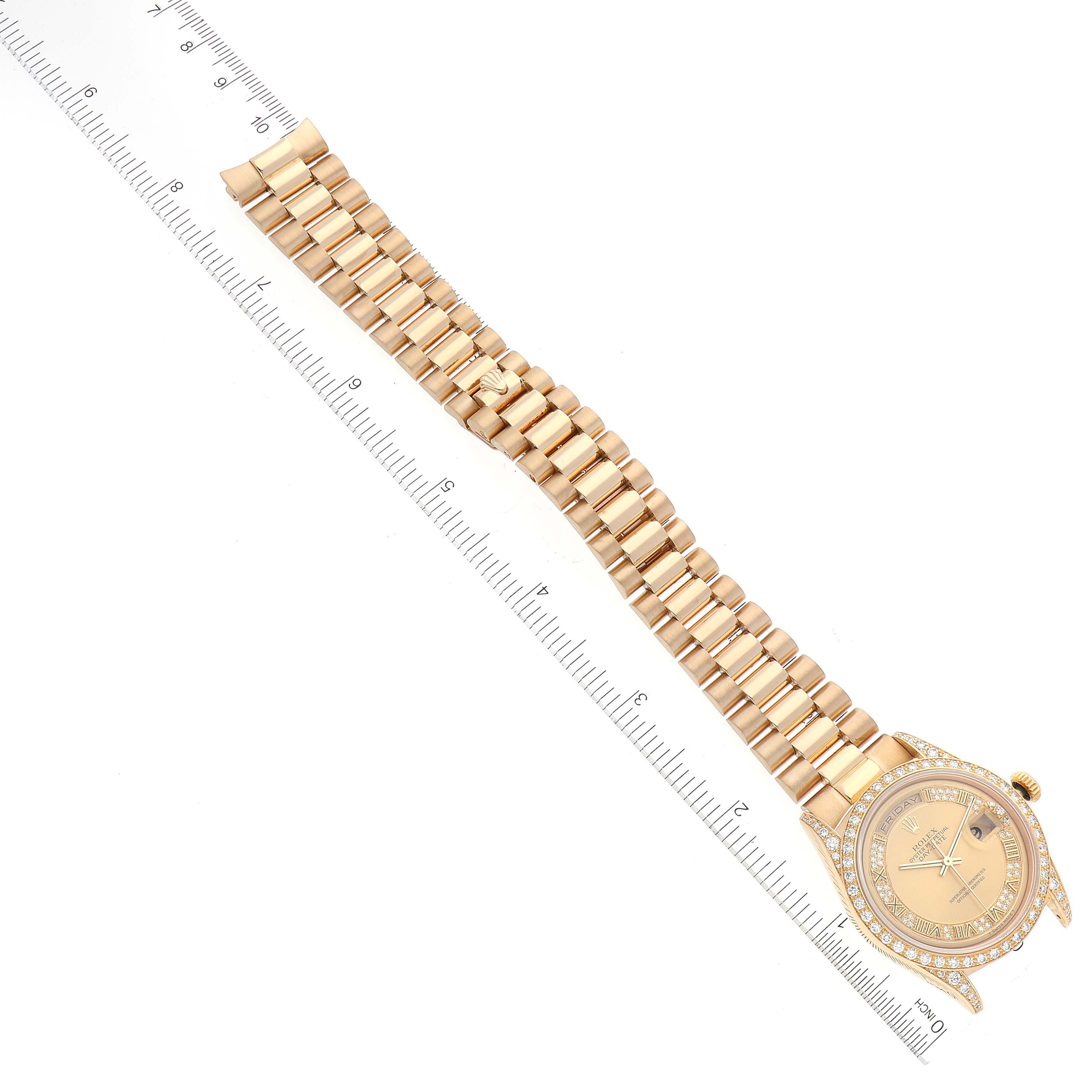 The image shows a top-down view of a Rolex President 18388 Men
s Yellow Gold Champagne Dial 18388 Men
s Yellow Gold Champagne Dial model watch, highlighting its gold bracelet, dial, and diamond-encrusted bezel.