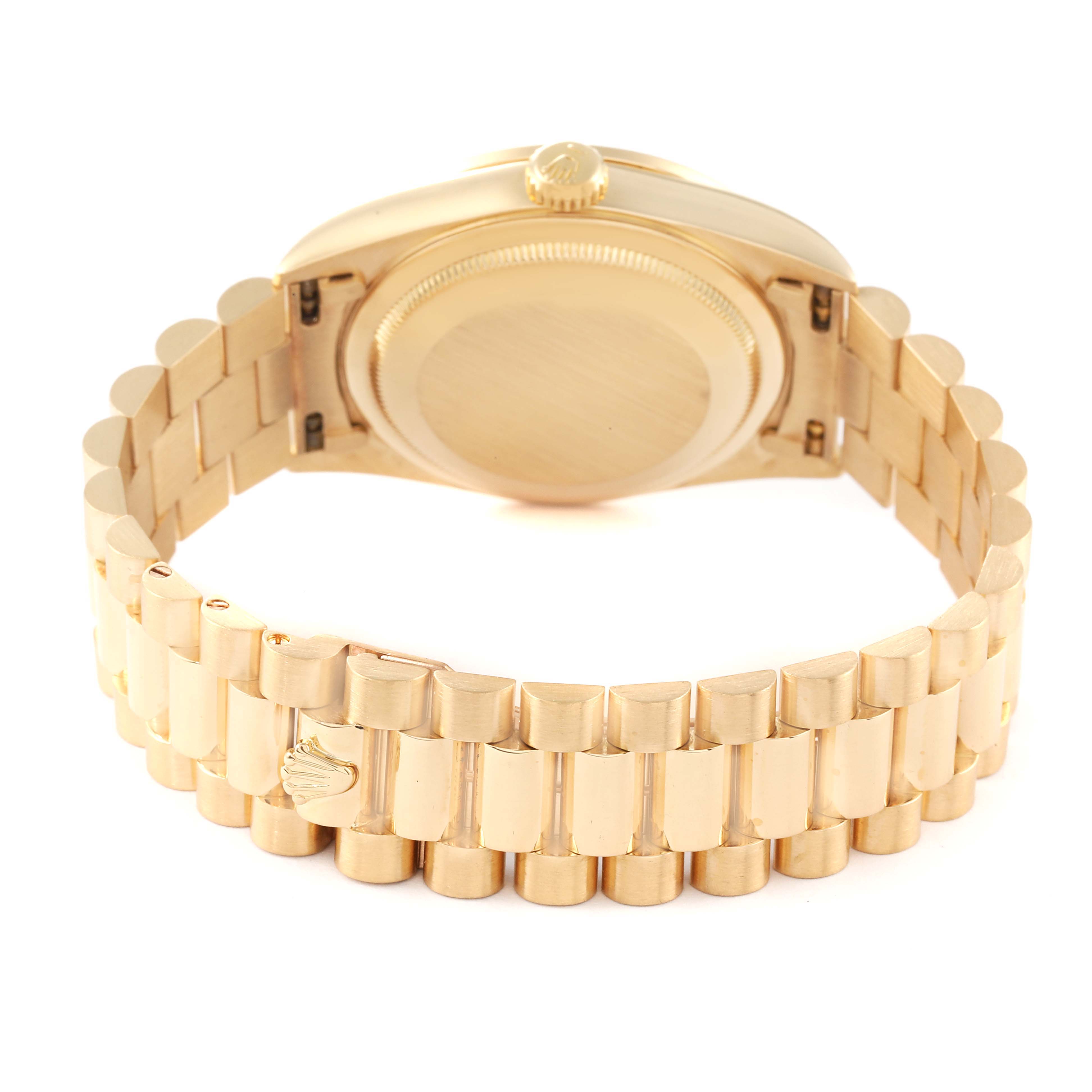This image shows the case back, crown, and bracelet of a Rolex President 18388 Men
s Yellow Gold Champagne Dial 18388 Men
s Yellow Gold Champagne Dial model watch from a rear angle.