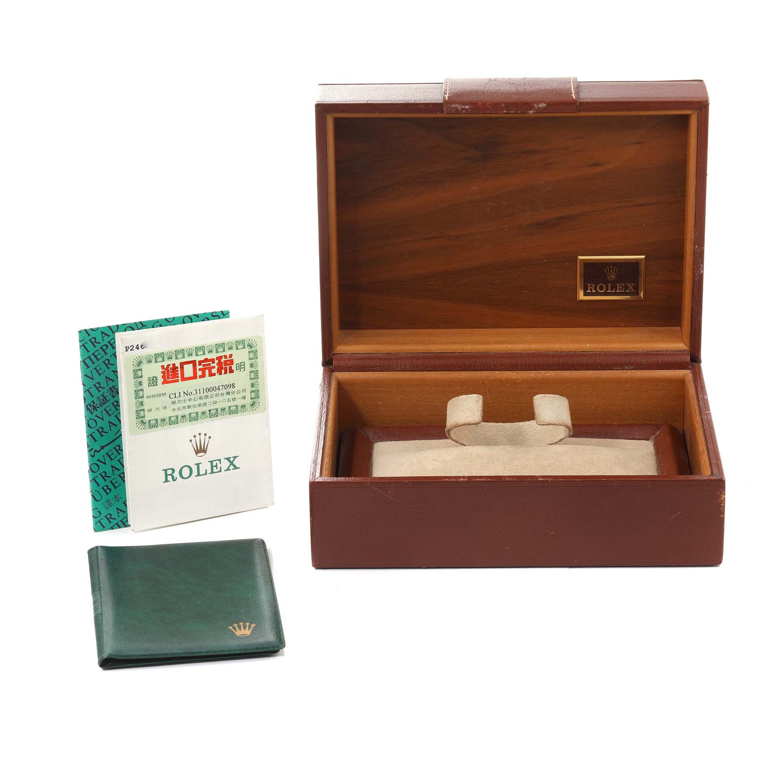 This image shows the packaging and accessories for a Rolex President 118238 Men
s Yellow Gold White Dial 118238 Men
s Yellow Gold White Dial model watch, including an open box, booklets, and a green leather wallet.