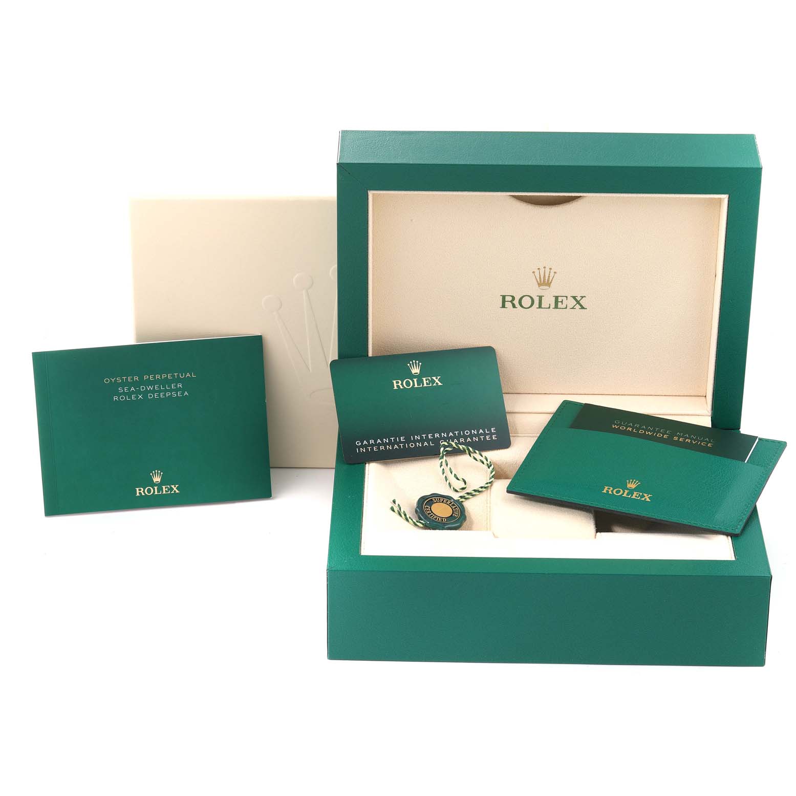 The image shows the packaging and documentation for a Rolex Sea-Dweller 126660 Men
s Stainless Steel Blue Dial 126660 Men
s Stainless Steel Blue Dial, including the box, booklets, and a tag.