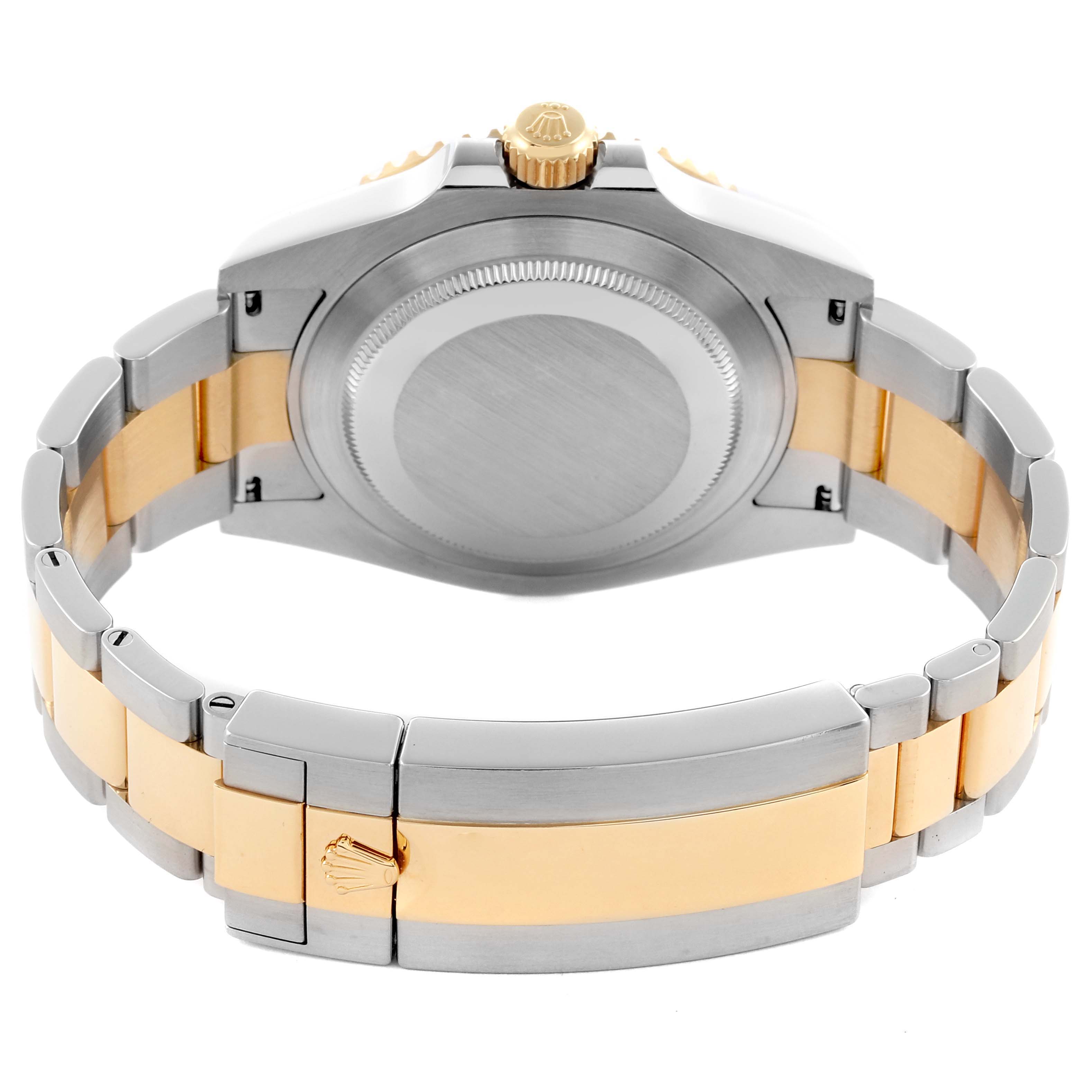 The image shows the back and bracelet of a Rolex Submariner 126613LB Men's Steel and Gold (two tone) Blue Dial 126613LB Men's Steel and Gold (two tone) Blue Dial, highlighting its two-tone metal design and clasp.