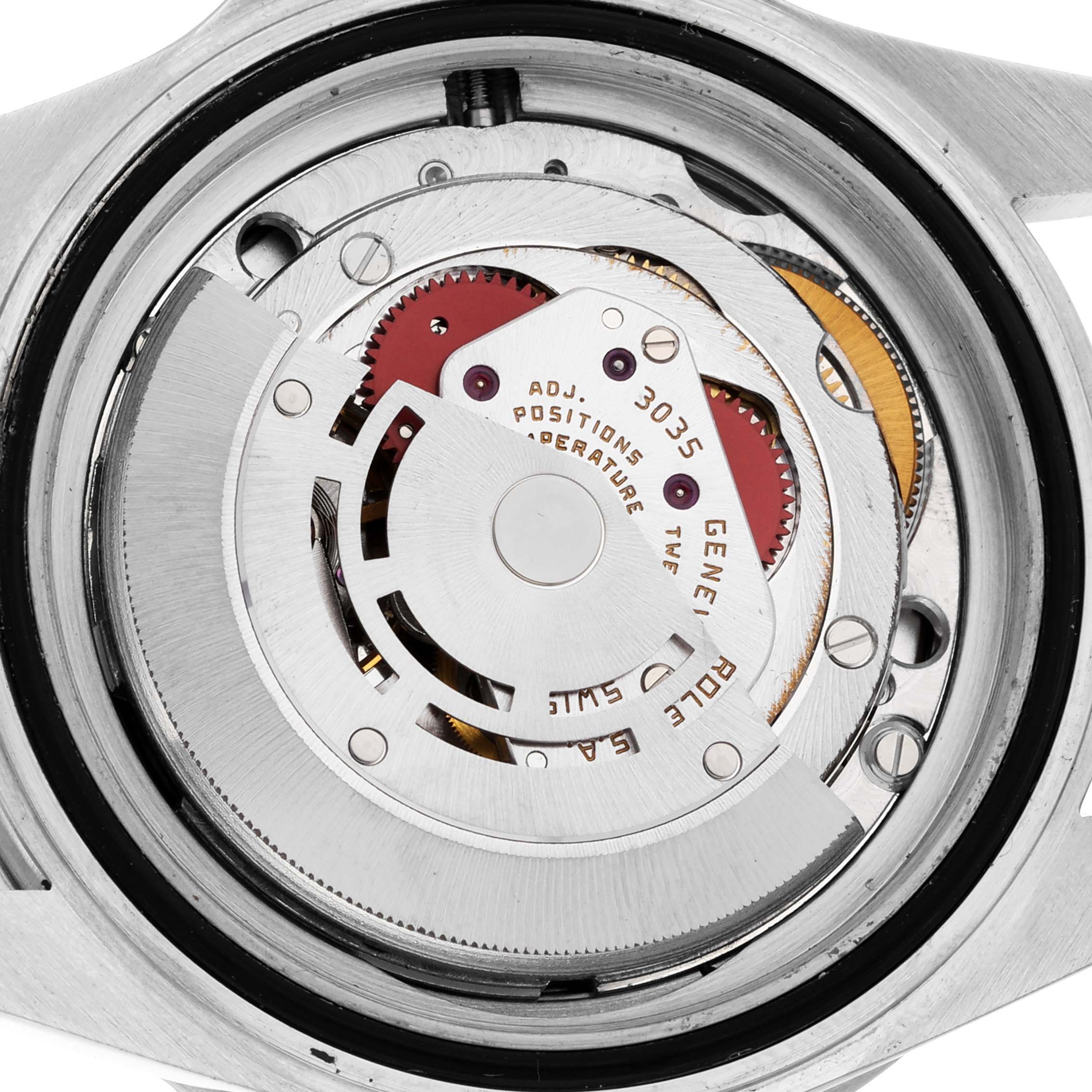 This image shows the internal mechanism of the Vintage Collection Rolex watch from a back angle.