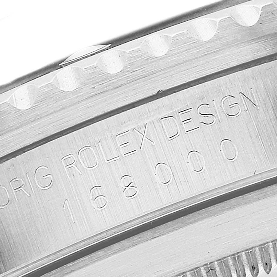 This close-up image shows the engraved serial number and brand details on the case side of a Rolex Vintage Collection 168000 Men
s Stainless Steel Black Dial 168000 Men
s Stainless Steel Black Dial model.