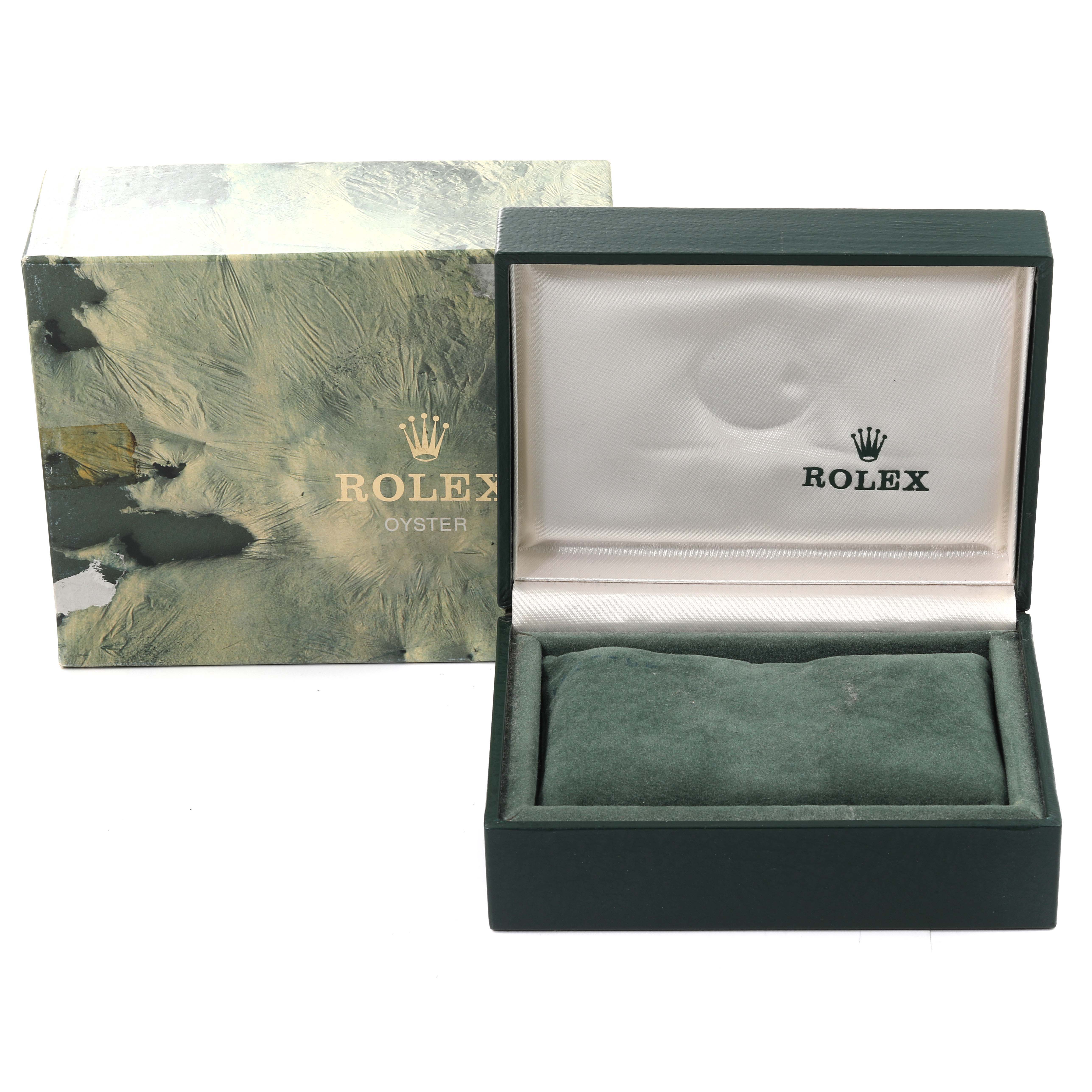This image shows the box and case of a Rolex Vintage Collection 168000 Men
s Stainless Steel Black Dial 168000 Men
s Stainless Steel Black Dial model, with the box open displaying the cushion inside.