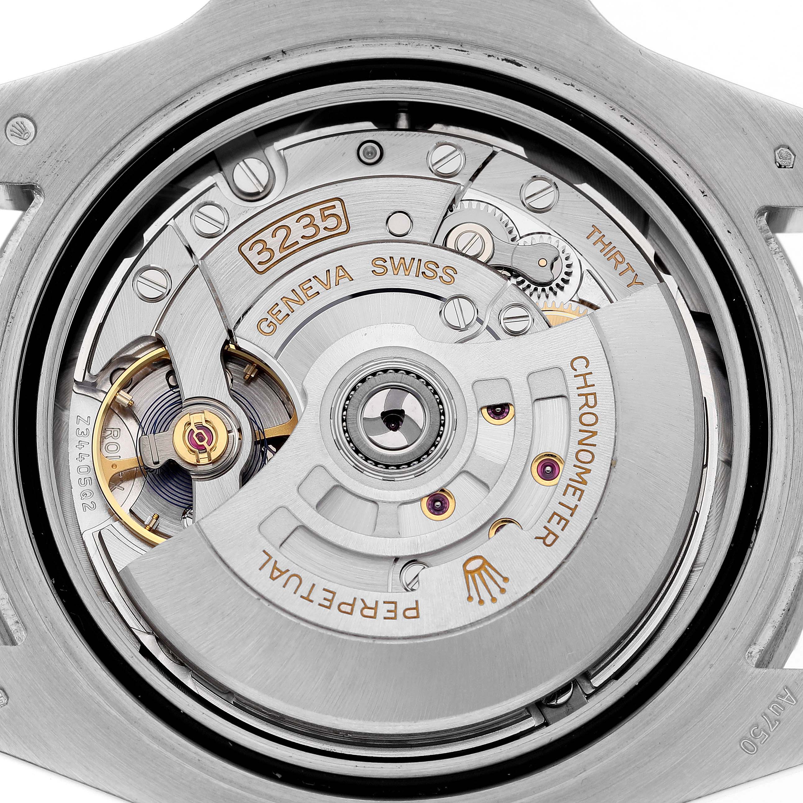 This image shows the movement of a Rolex Submariner 126619 Men's White Gold Black Dial 126619 Men's White Gold Black Dial watch from a back view, highlighting its internal mechanics.