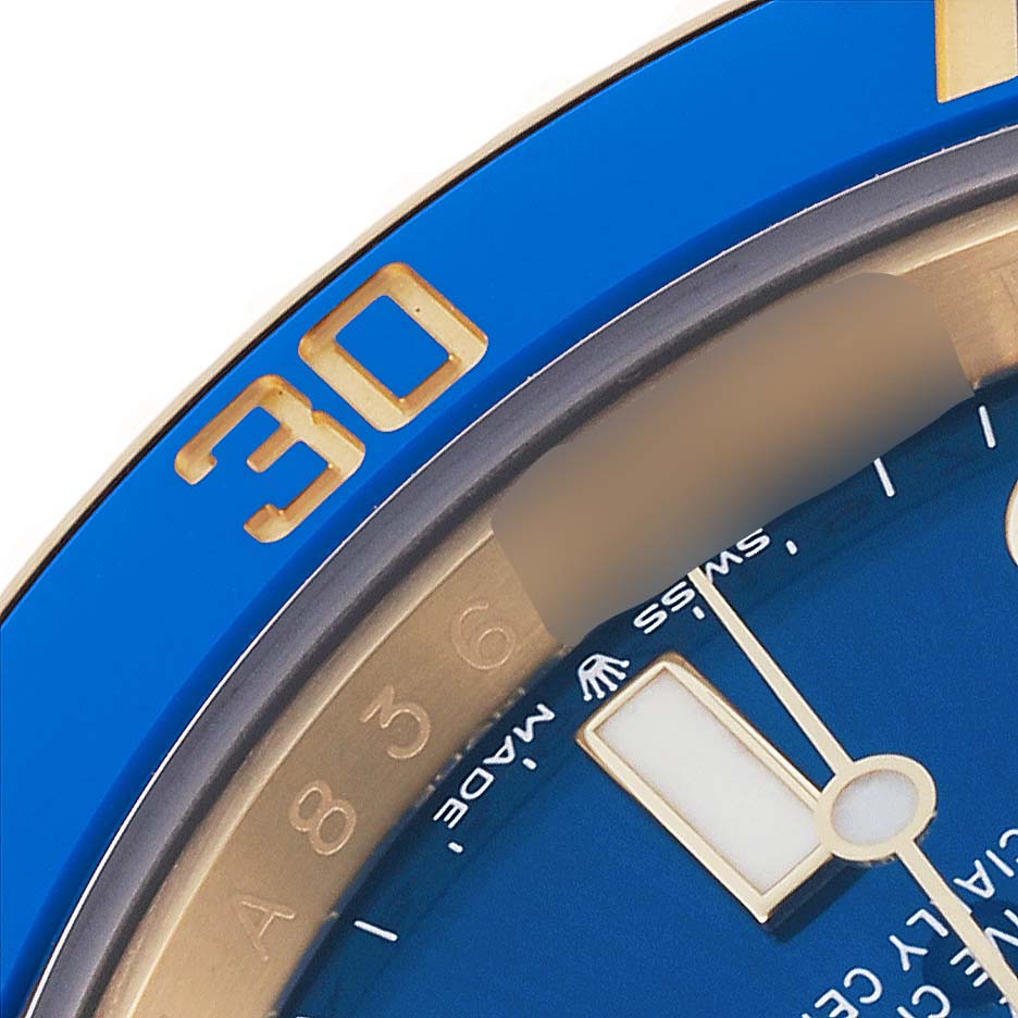 The close-up image shows the bezel and part of the dial of a Rolex Submariner 126618LB Men's Yellow Gold Blue Dial 126618LB Men's Yellow Gold Blue Dial, focusing on the 30-minute mark.