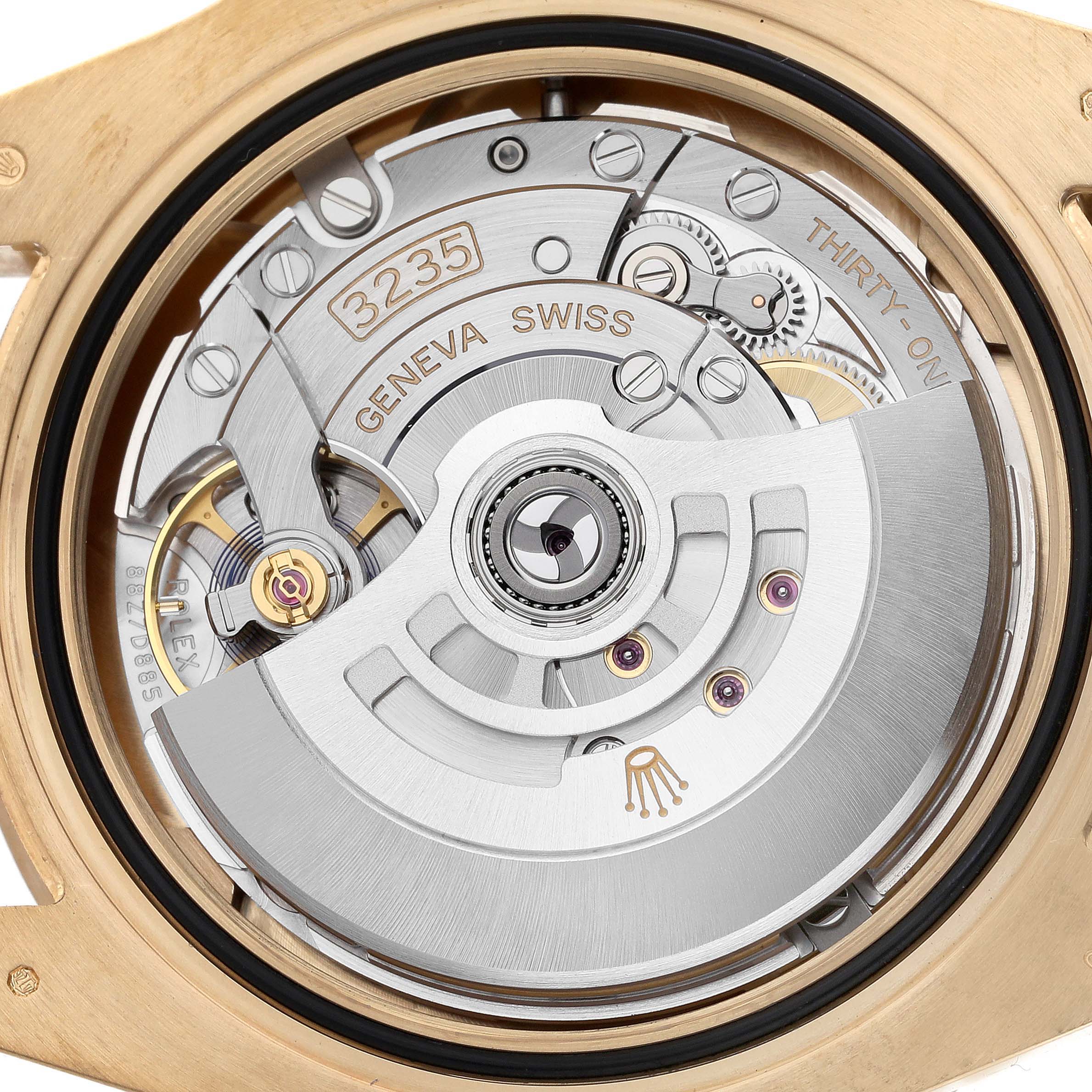 The image shows the movement of a Rolex Submariner 126618LB Men's Yellow Gold Blue Dial 126618LB Men's Yellow Gold Blue Dial, highlighting the rotor and internal mechanics.