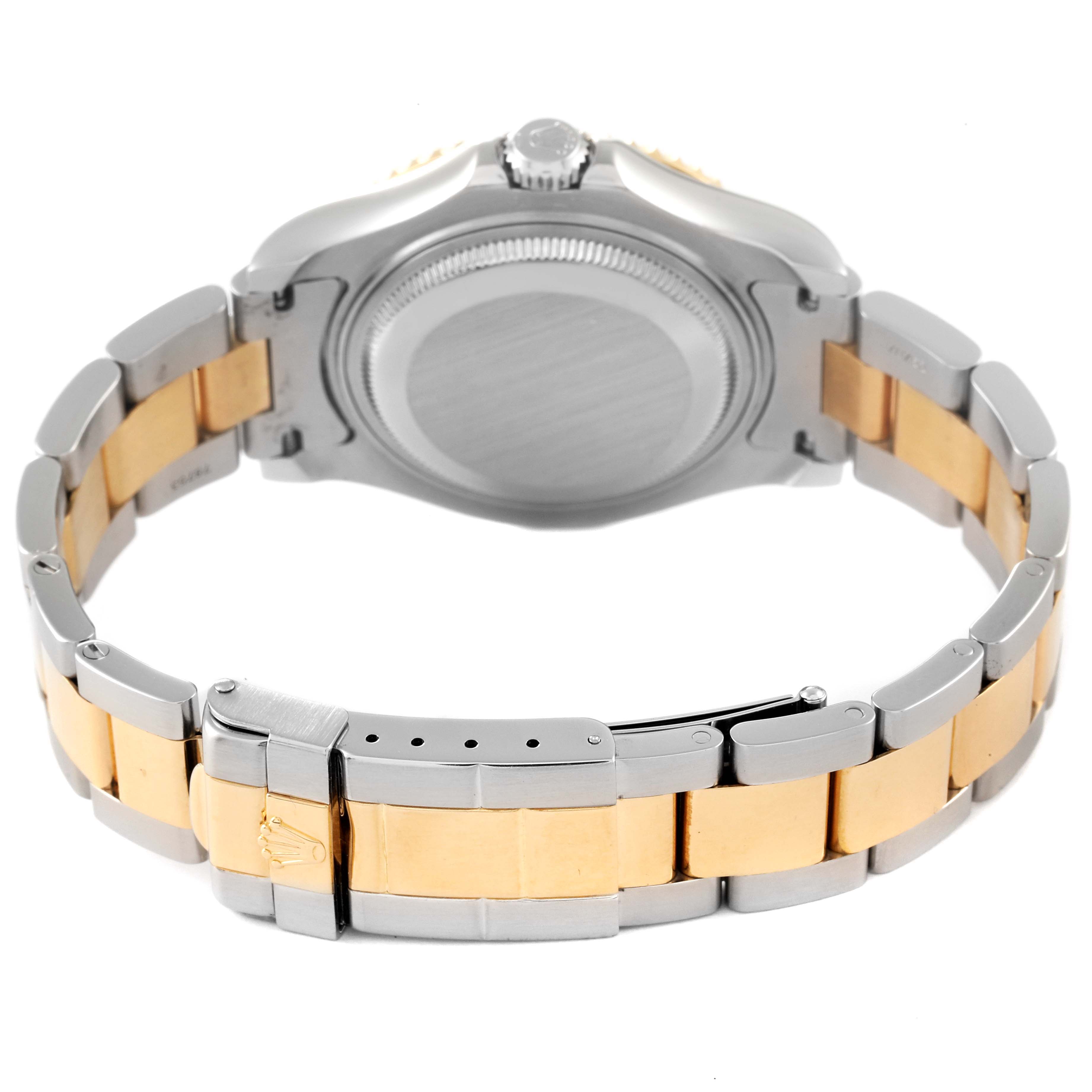 The Rolex Yacht-Master 68623 Men
s Steel and Gold (two tone) White Dial 68623 Men
s Steel and Gold (two tone) White Dial watch is shown from the back, highlighting the case back and two-tone bracelet.