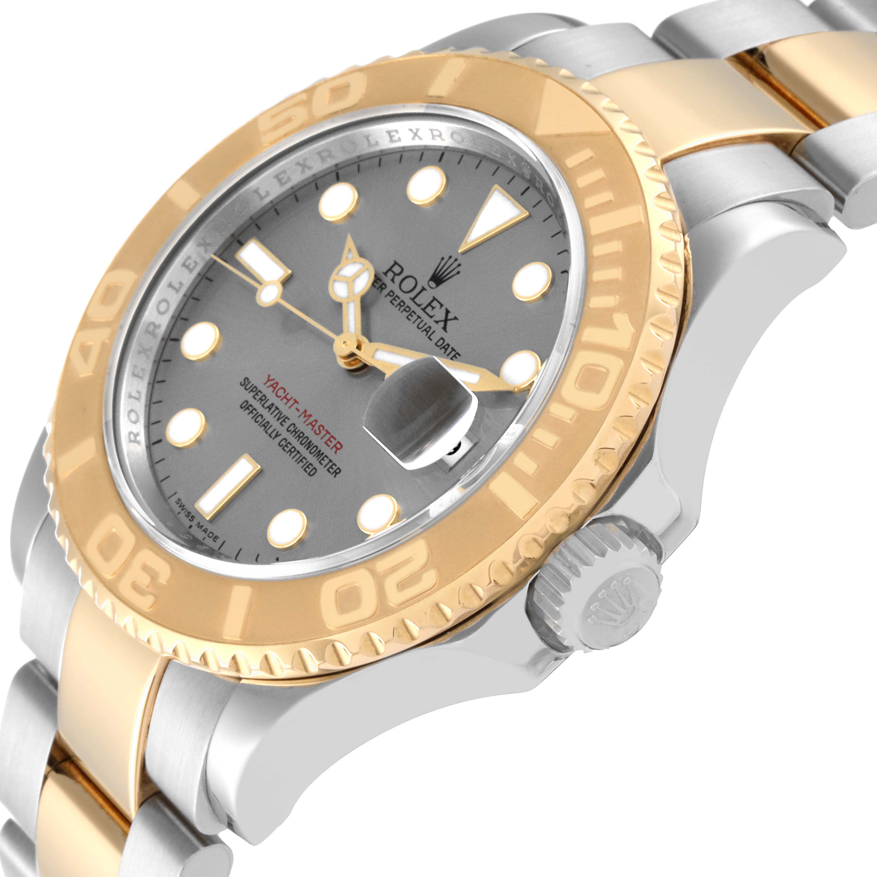 The image shows a side angle of a Rolex Yacht-Master 16623 Men
s Steel and Gold (two tone) Grey Dial 16623 Men
s Steel and Gold (two tone) Grey Dial watch, highlighting the crown, bezel, dial, and part of the bracelet.