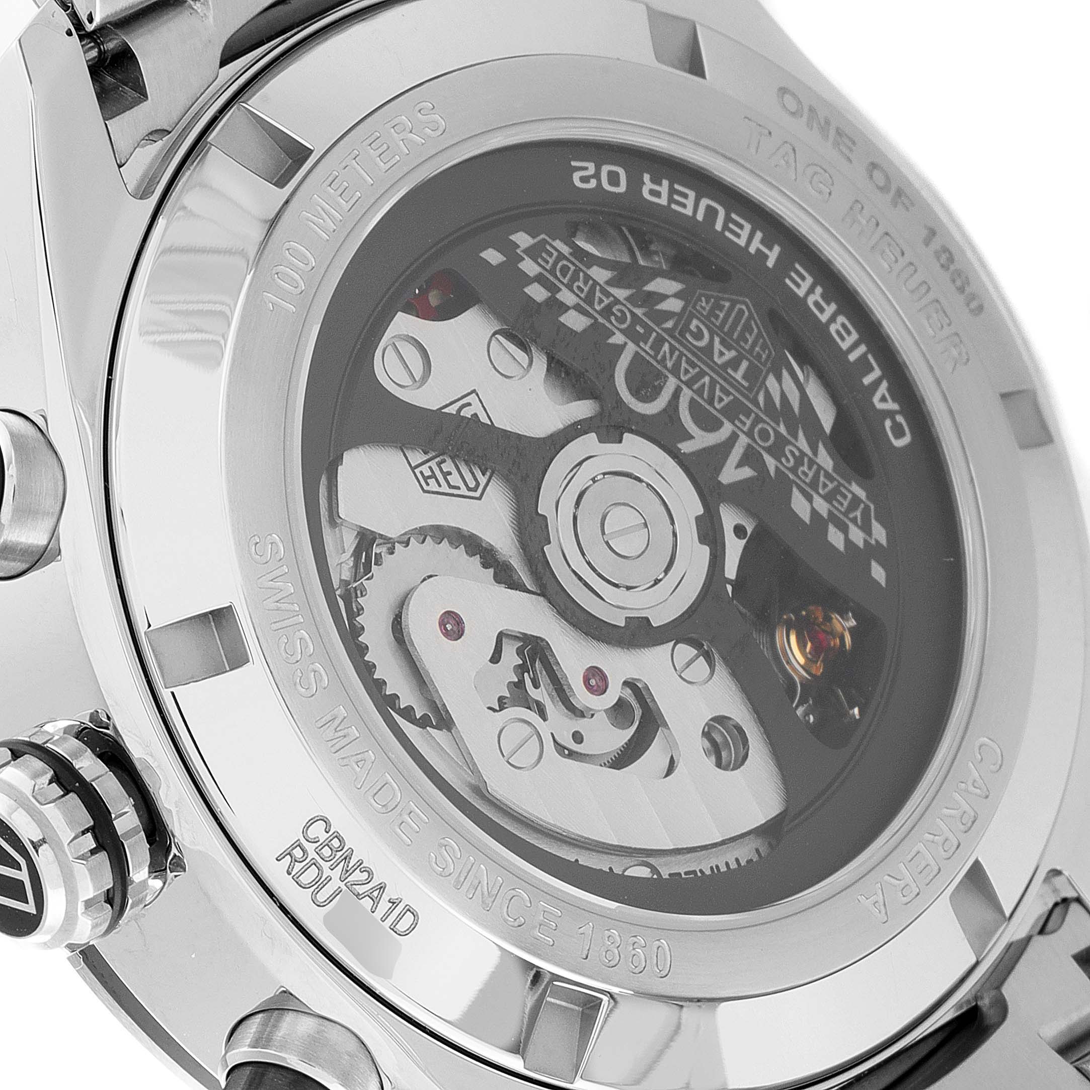 This image shows the back of the Tag Heuer Carrera CBN2A1D.BA0643 Men's Stainless Steel Silver Dial CBN2A1D.BA0643 Men's Stainless Steel Silver Dial watch, highlighting the movement and intricate inner mechanisms.