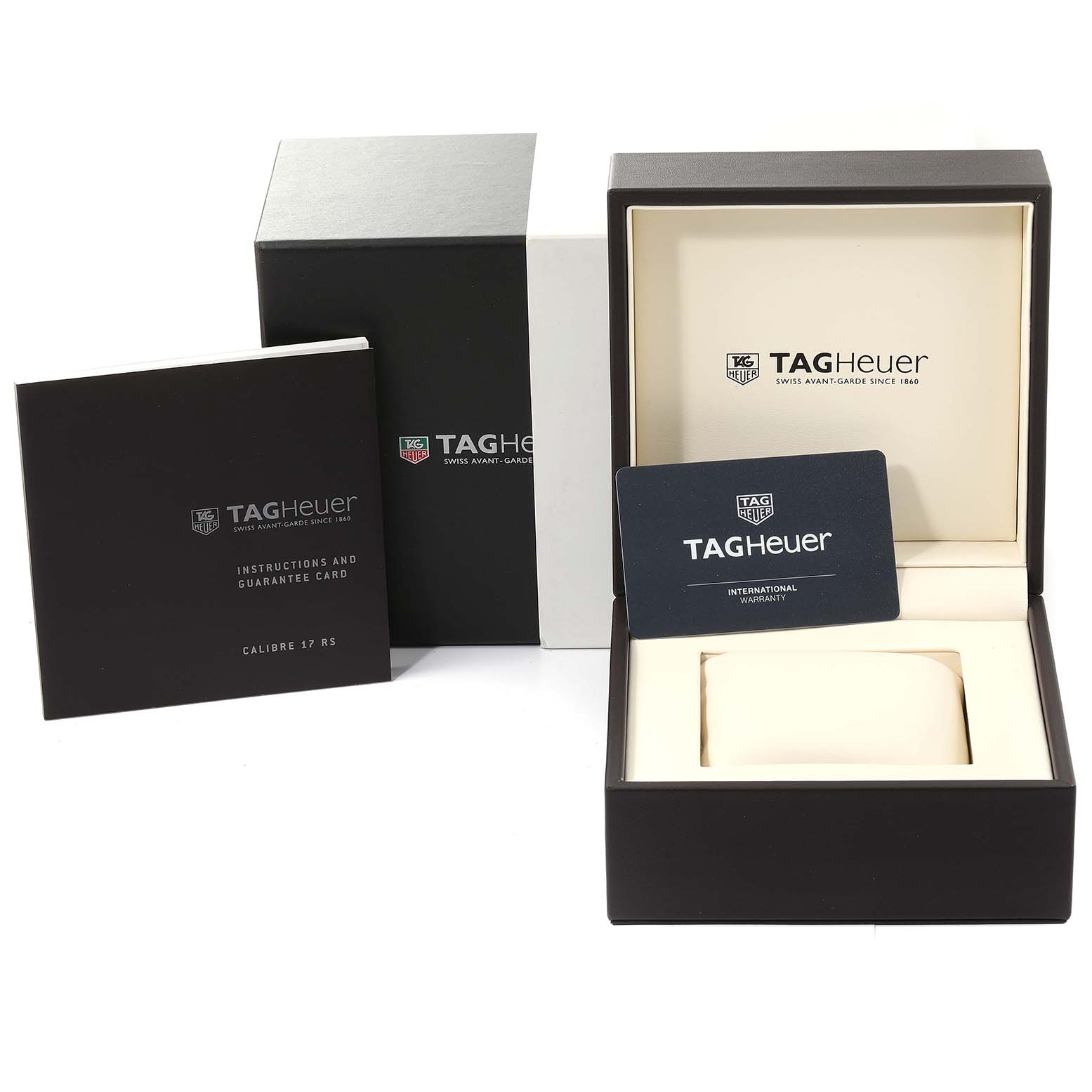 The image shows the packaging, instruction booklet, and warranty card for a Tag Heuer Carrera CAV511B.BA0902 Men
s Stainless Steel Silver Dial CAV511B.BA0902 Men
s Stainless Steel Silver Dial watch.