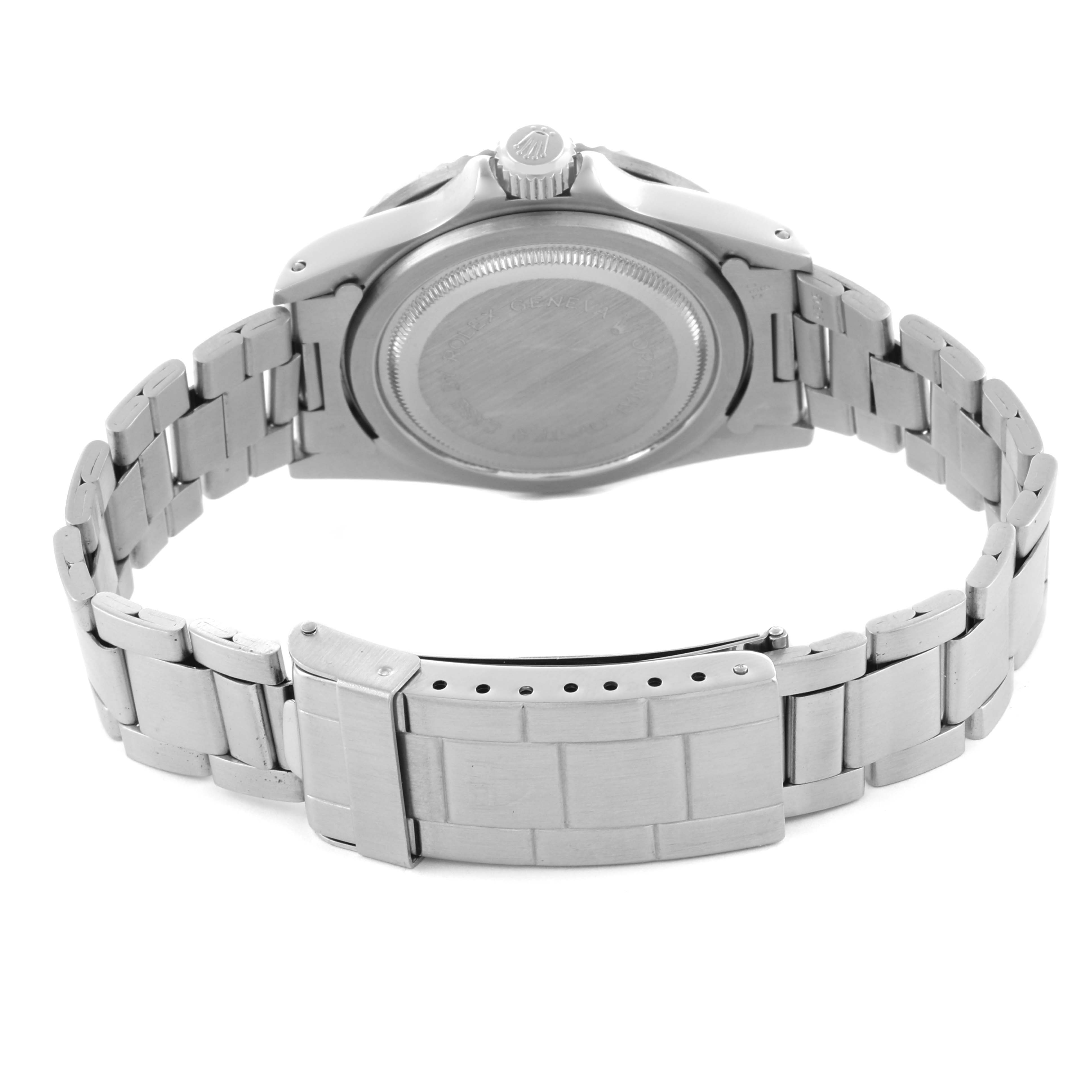 The image shows the backside and band of a Tudor Submariner 79090 Men's Stainless Steel Blue Dial 79090 Men's Stainless Steel Blue Dial watch at an angle focusing on the clasp and links.