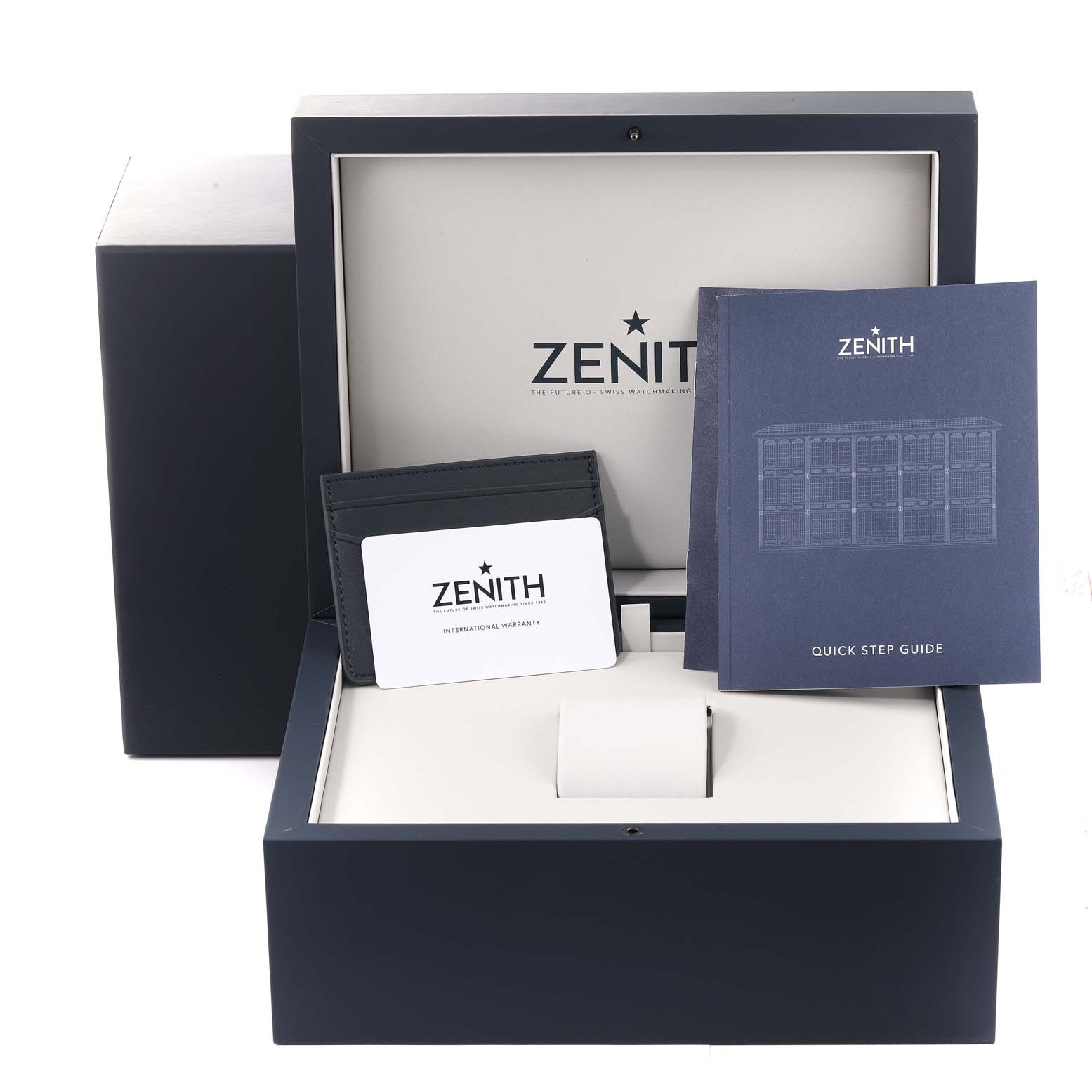 This image shows a Zenith El Primero watch box with an international warranty card, cardholder, and quick step guide.