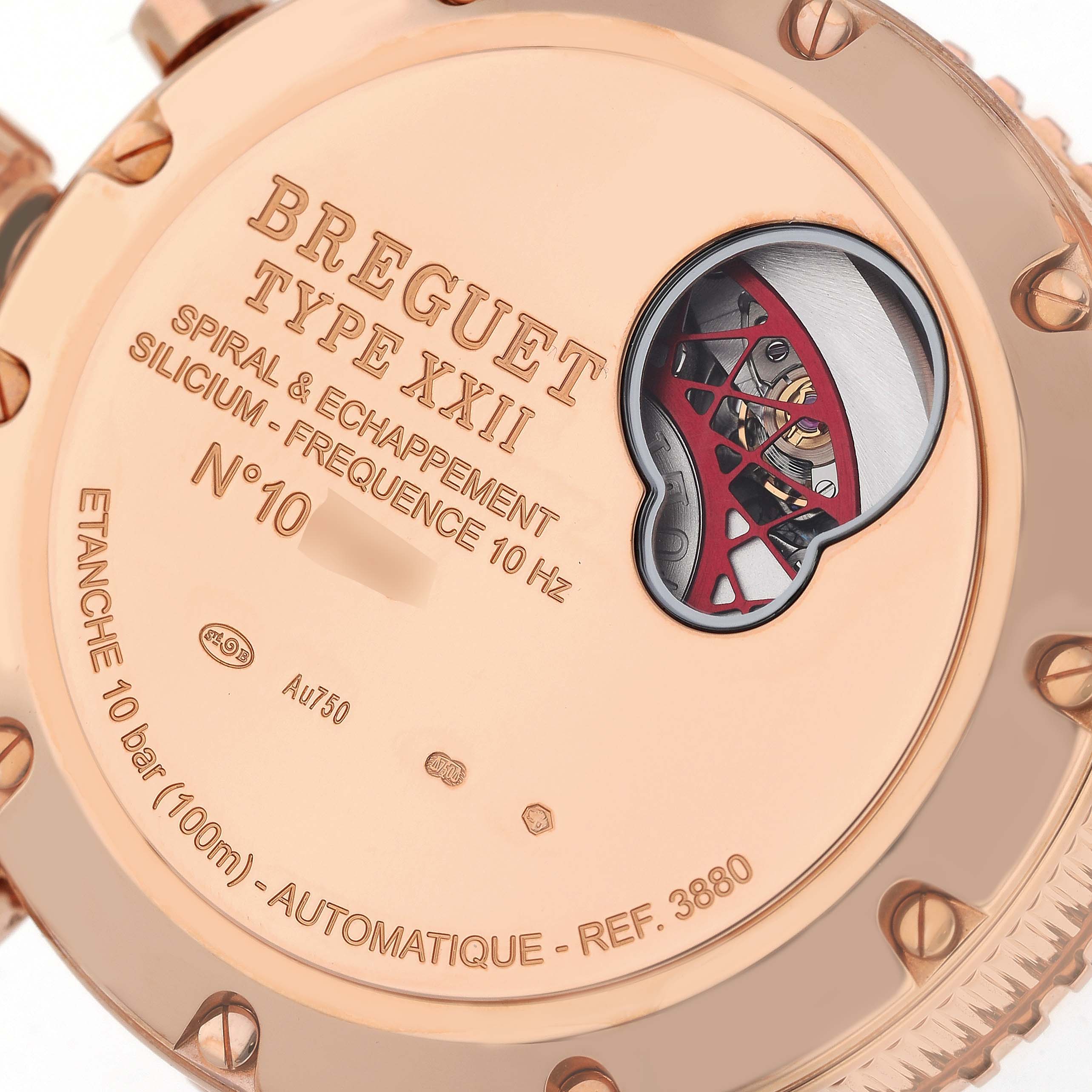 The image shows the case back of a Breguet Type XXII watch, highlighting its model details, water resistance, and part of the movement.
