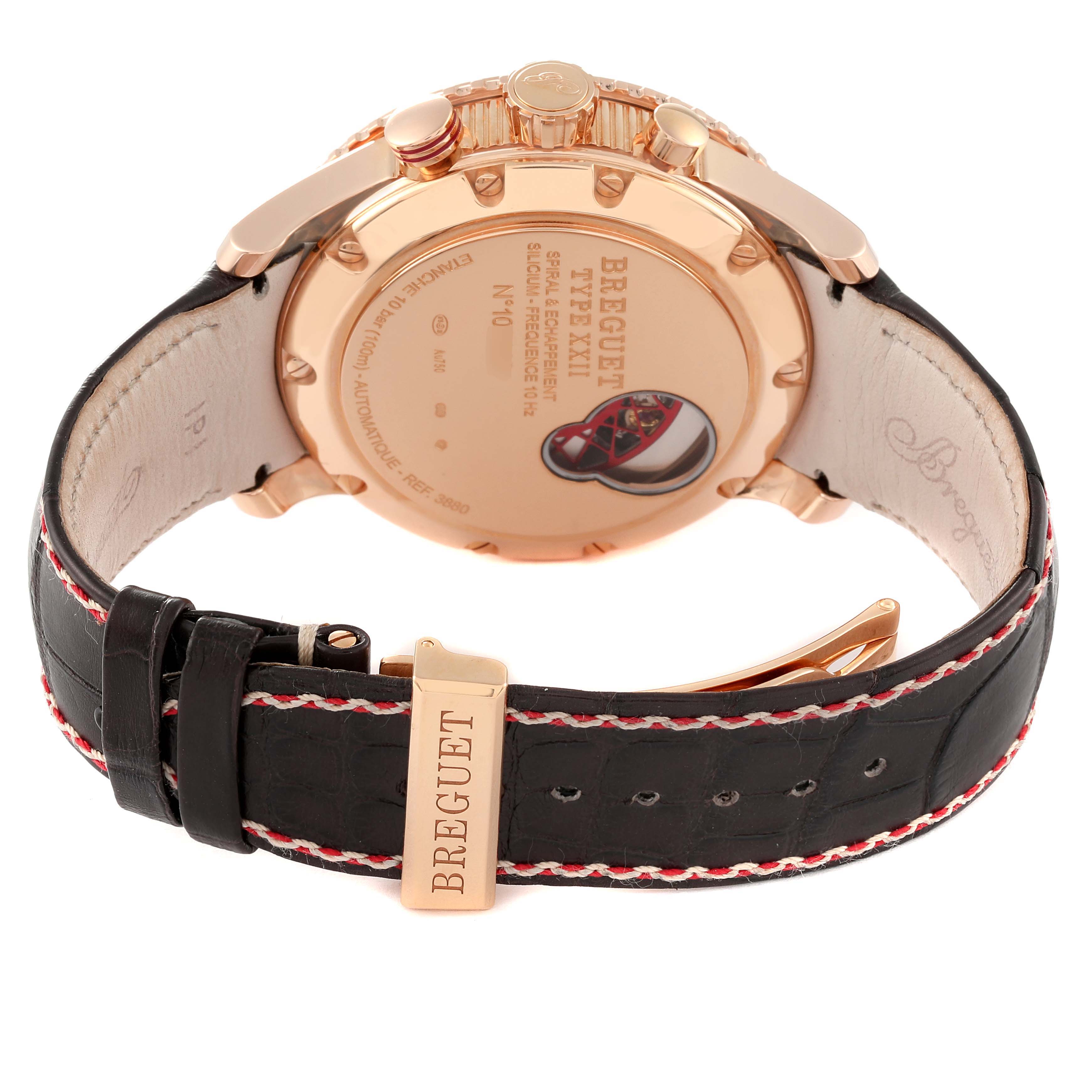 The image shows the back and side view of a Breguet Type XXI model watch with a black leather strap and gold clasp.