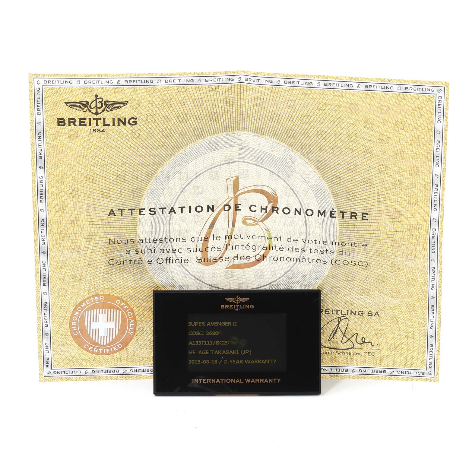 The image shows a Breitling Avenger A1337111/BC29 Men's Stainless Steel Black Dial A1337111/BC29 Men's Stainless Steel Black Dial model watch's certificate and international warranty card, photographed head-on.