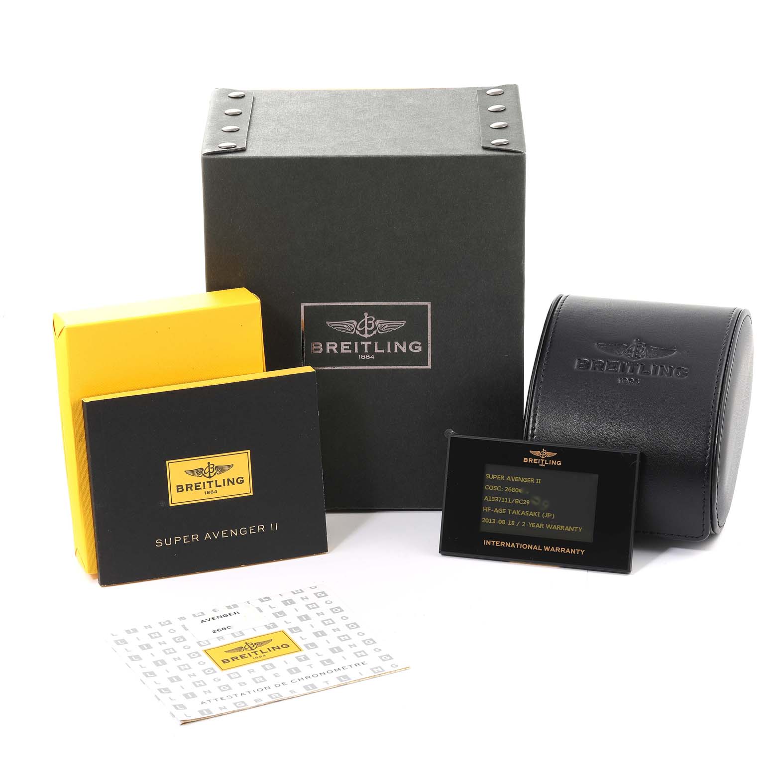 The image shows the packaging and accessories for a Breitling Avenger A1337111/BC29 Men's Stainless Steel Black Dial A1337111/BC29 Men's Stainless Steel Black Dial model, including boxes, warranty cards, and a watch case.