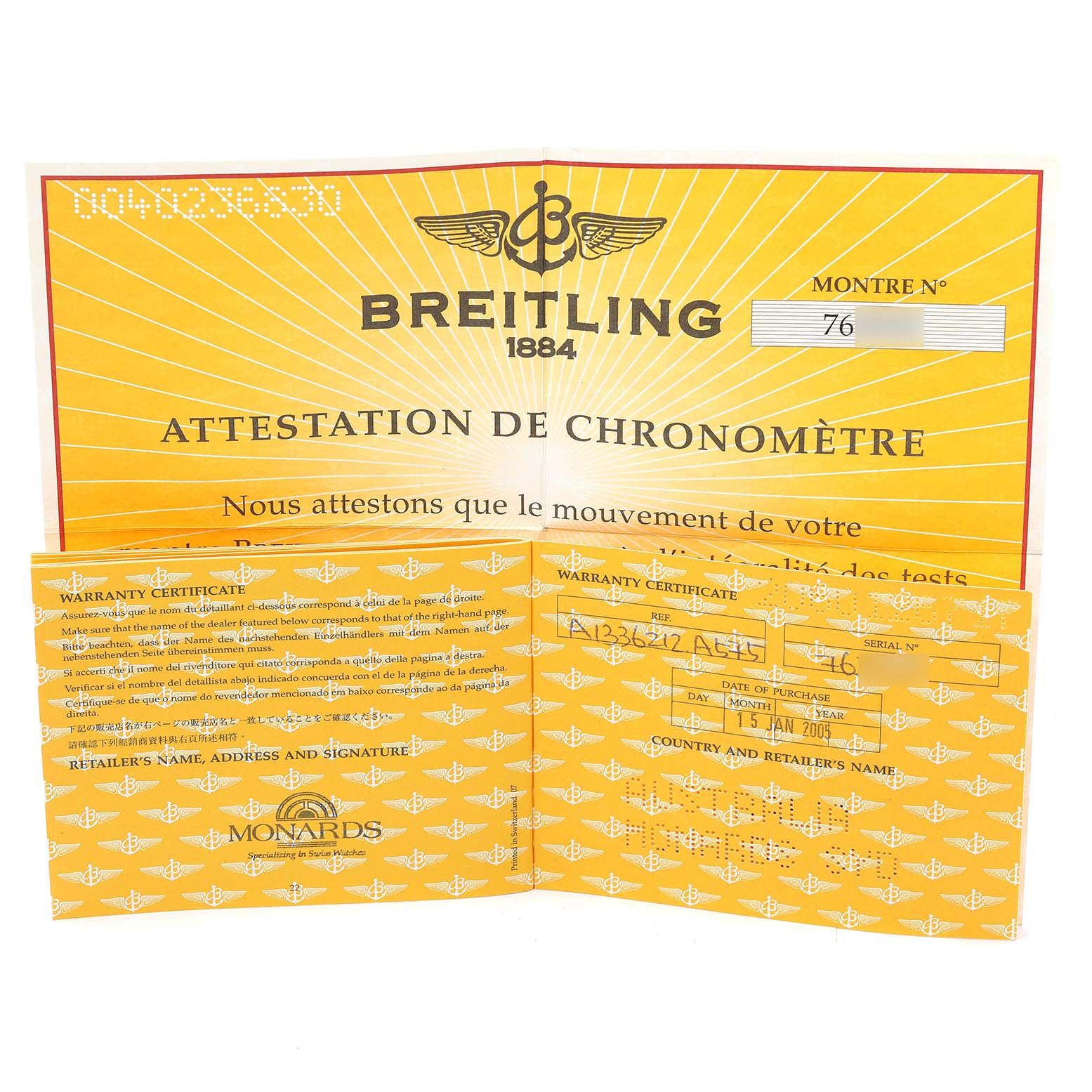 This image shows the warranty certificate and chronometer attestation for the Bentley model by Breitling.